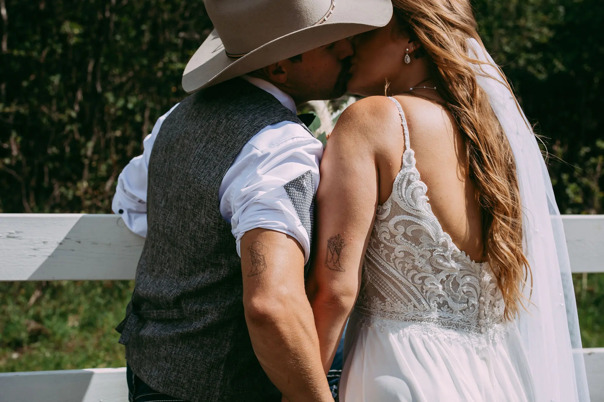 Groom With Bride Wearing Beaded Chiffon Sheath Wedding Dress Lorraine By Rebecca Ingram