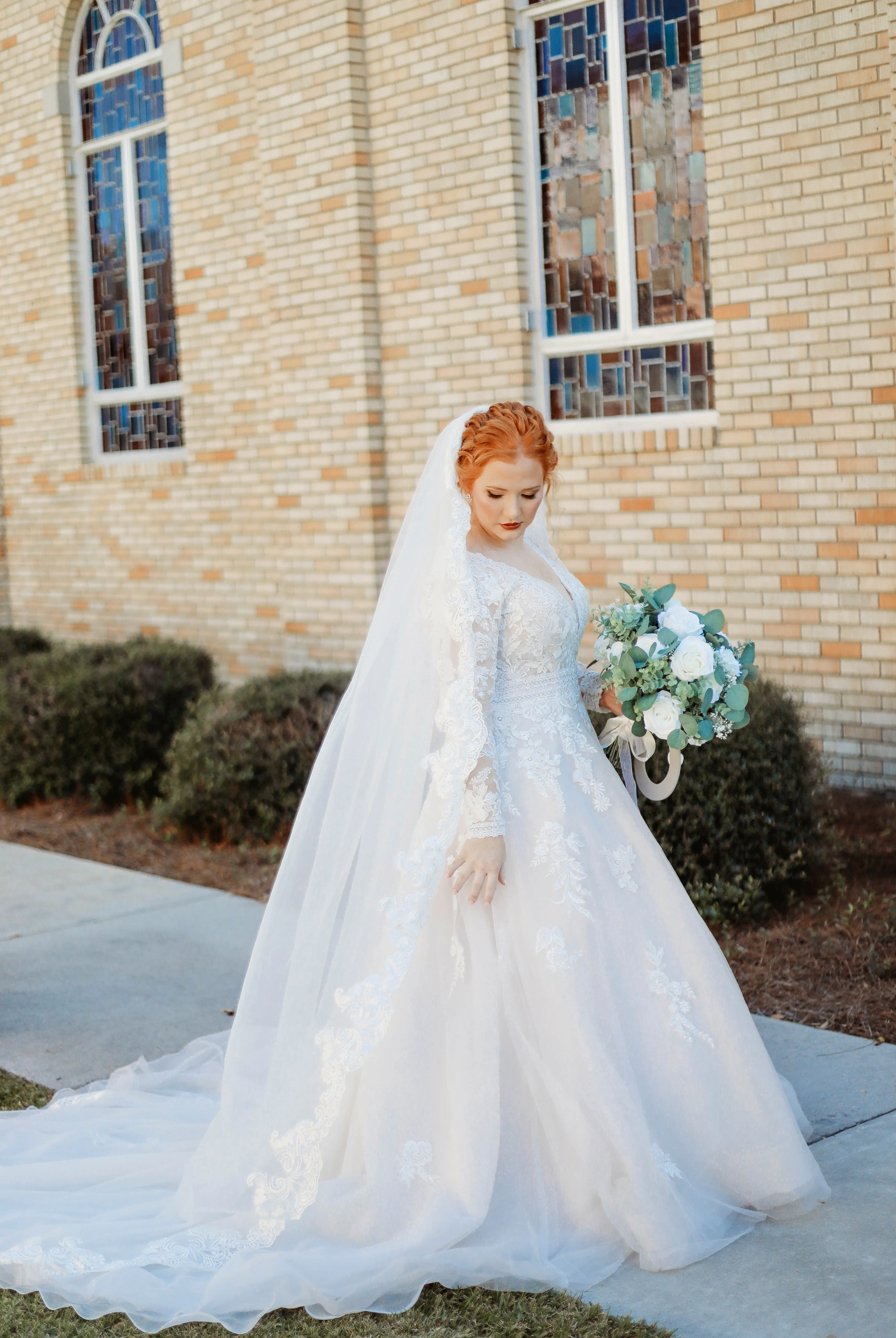 Bride Wearing Illusion Sleeve A-line Wedding Dress Called Raphael By Maggie Sottero