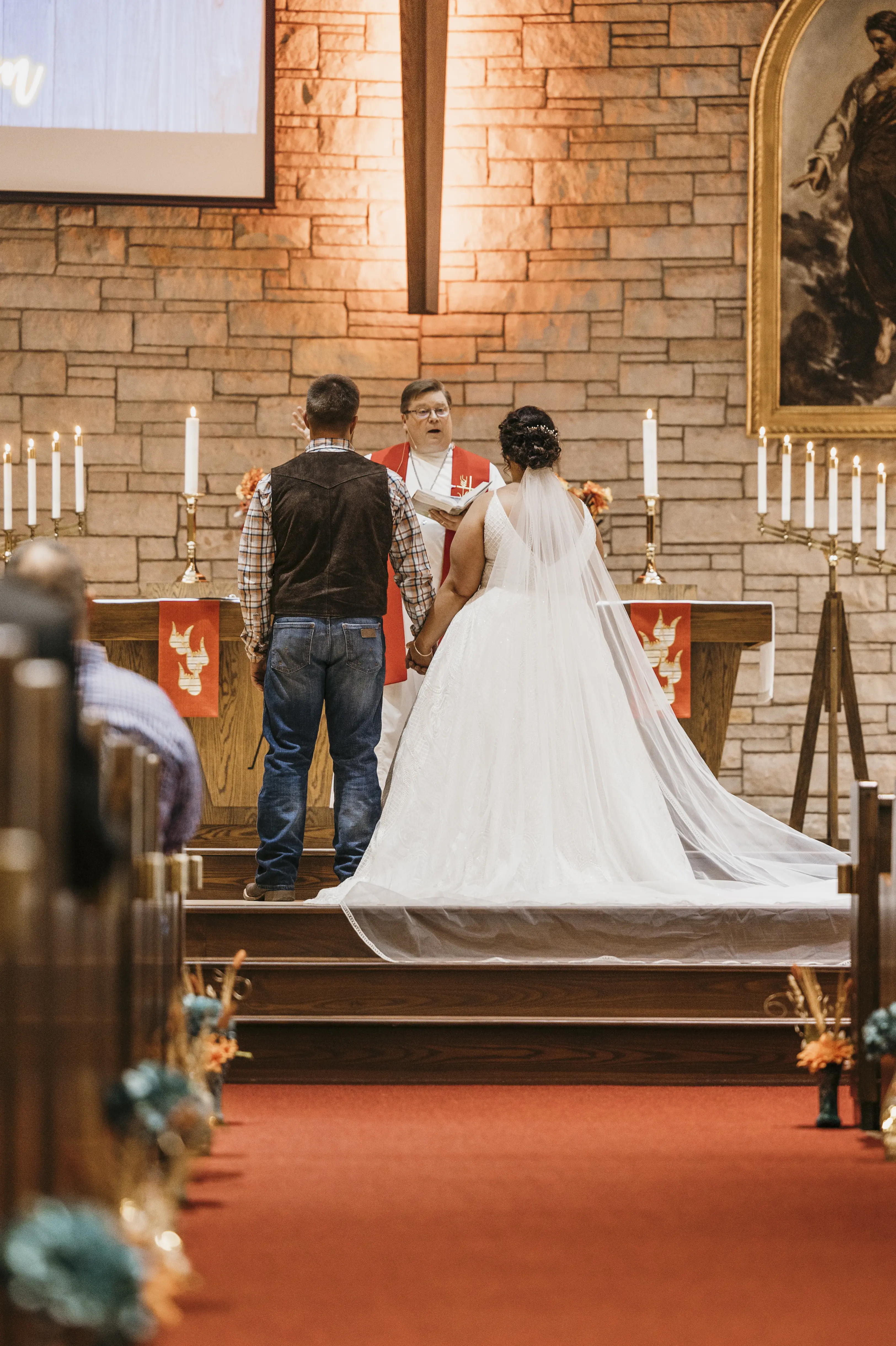 Groom at Alter with Bride in Dreamy Boho Princess A-Line Wedding Dress Called Roxanne by Sottero & Midgley