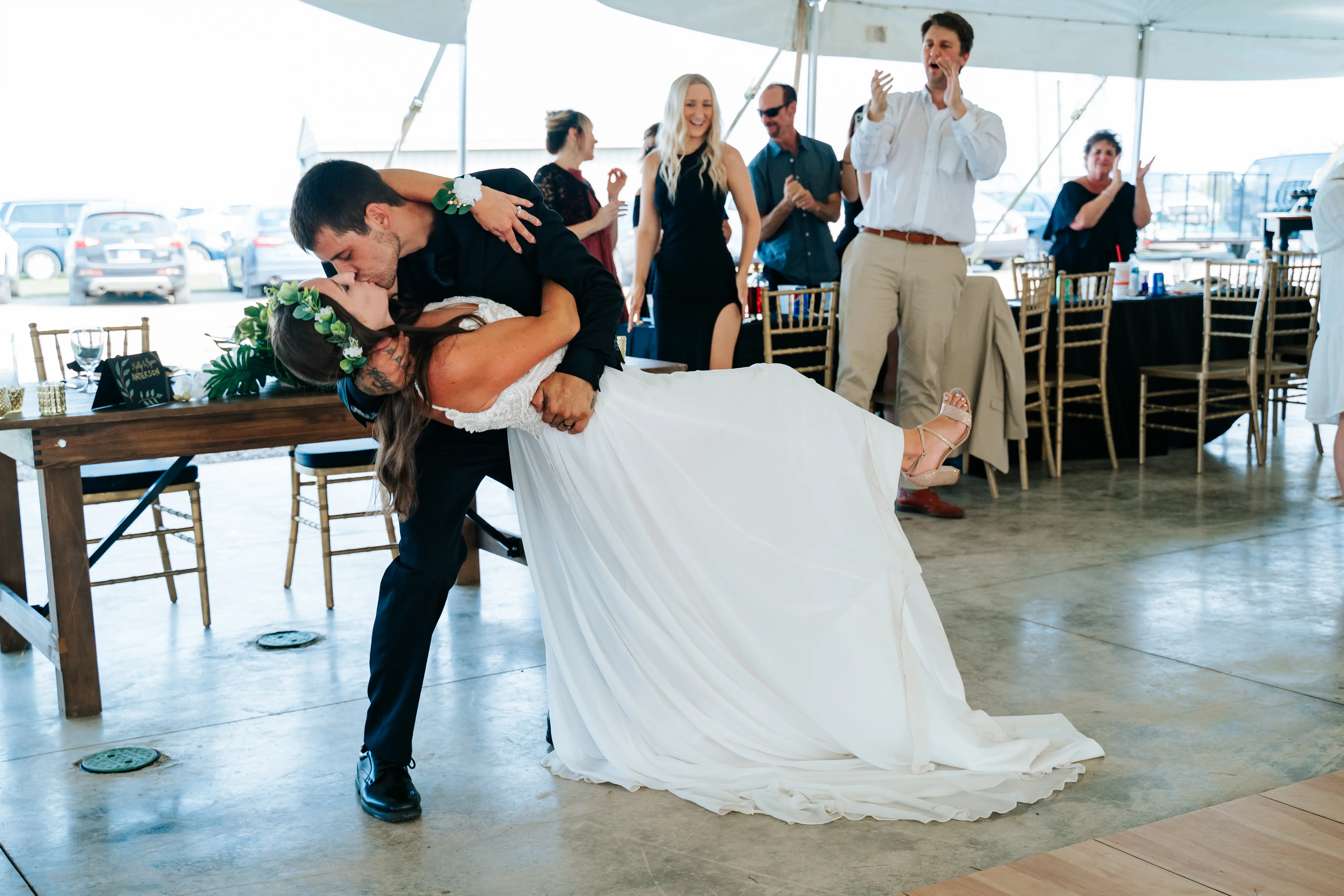 Bride Wearing Beach Sheath Wedding Dress Called Lorraine By Rebecca Ingram Kissing Groom