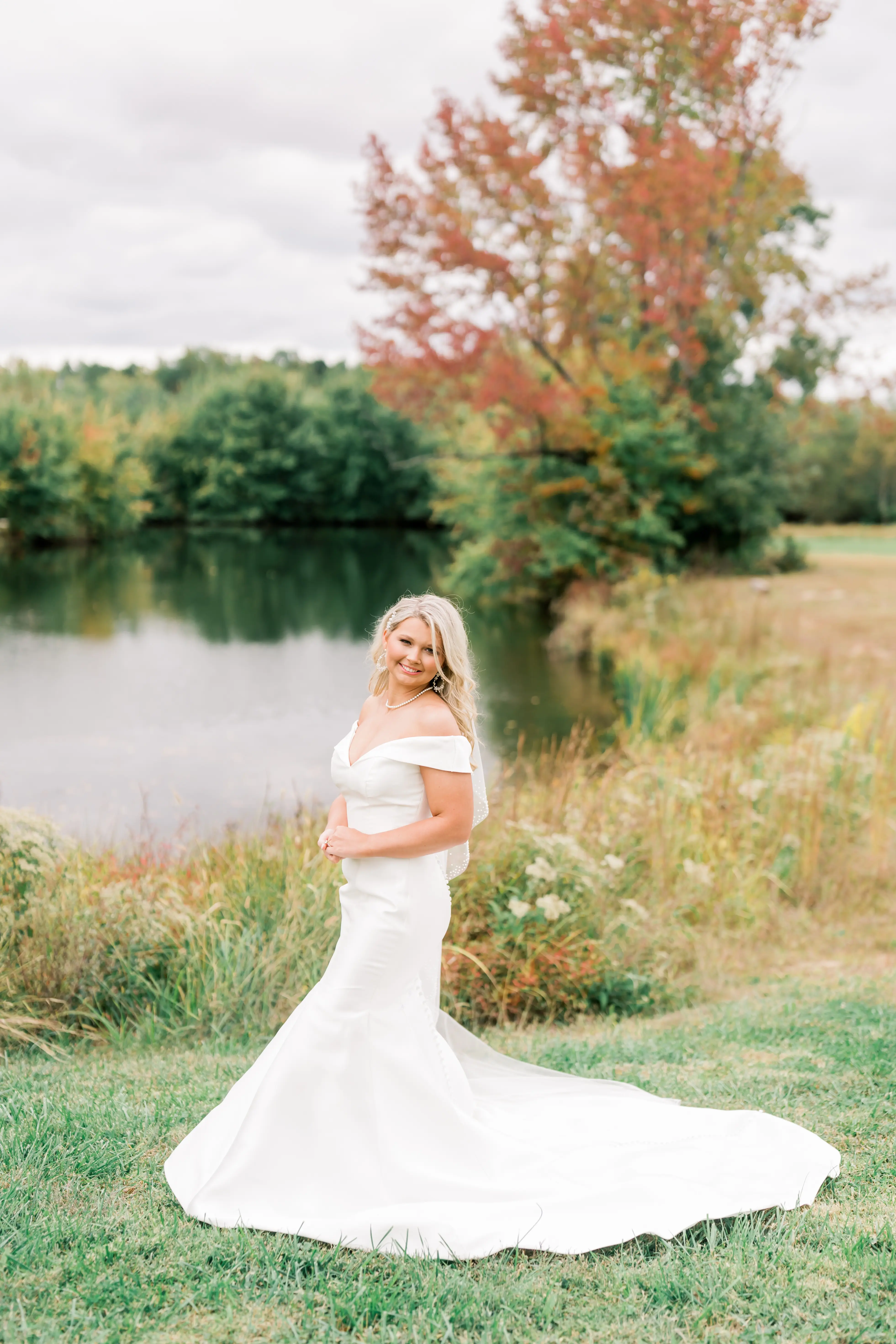 Bride wearing Josie wedding dress by Rebecca Ingram