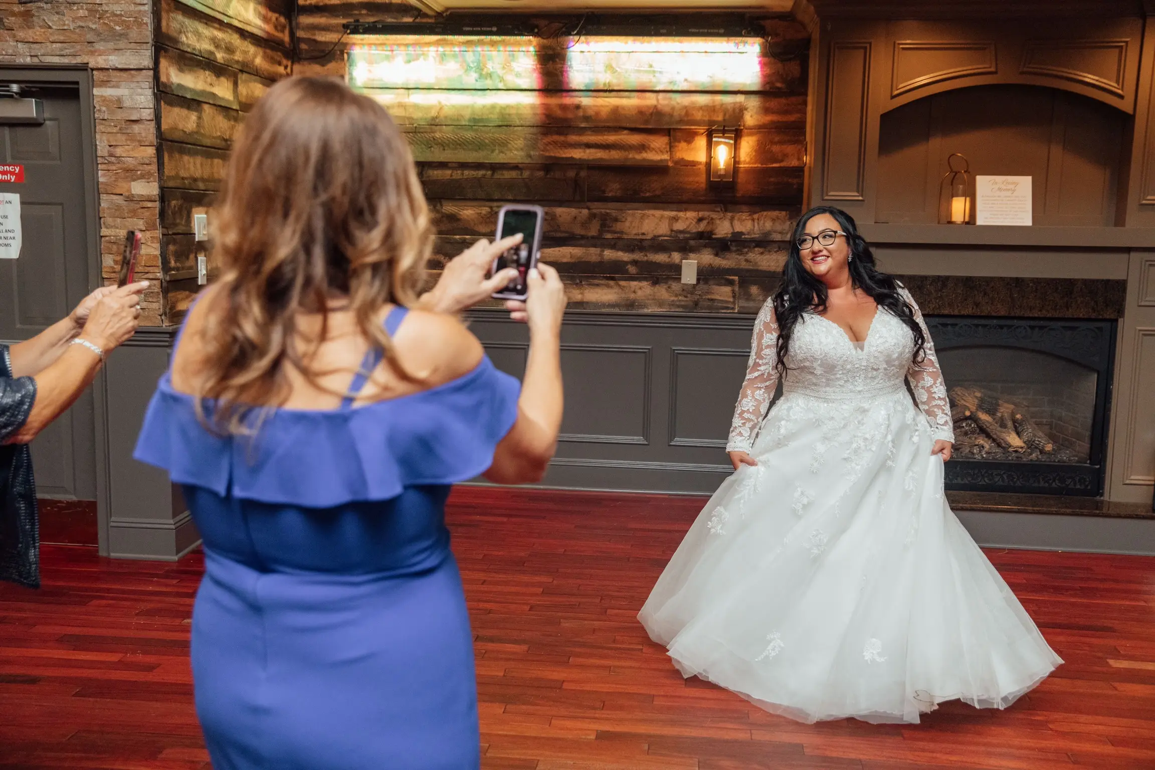 Bride Wearing Vintage Royalty Long Sleeve Wedding Dress Called Raphael By Maggie Sottero Doing A Spin For Photo Op