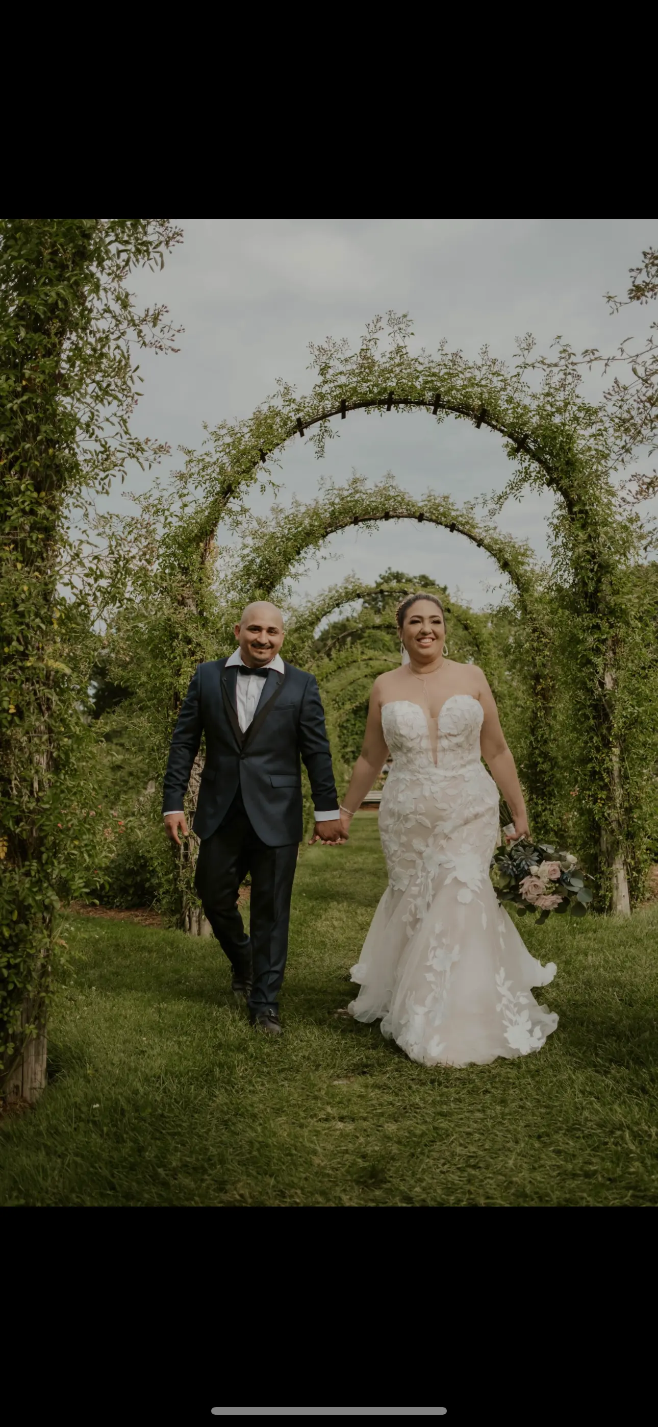 Groom Walking With Bride In A Mermaid Lace Wedding Dress Named Hattie By Rebecca Ingram