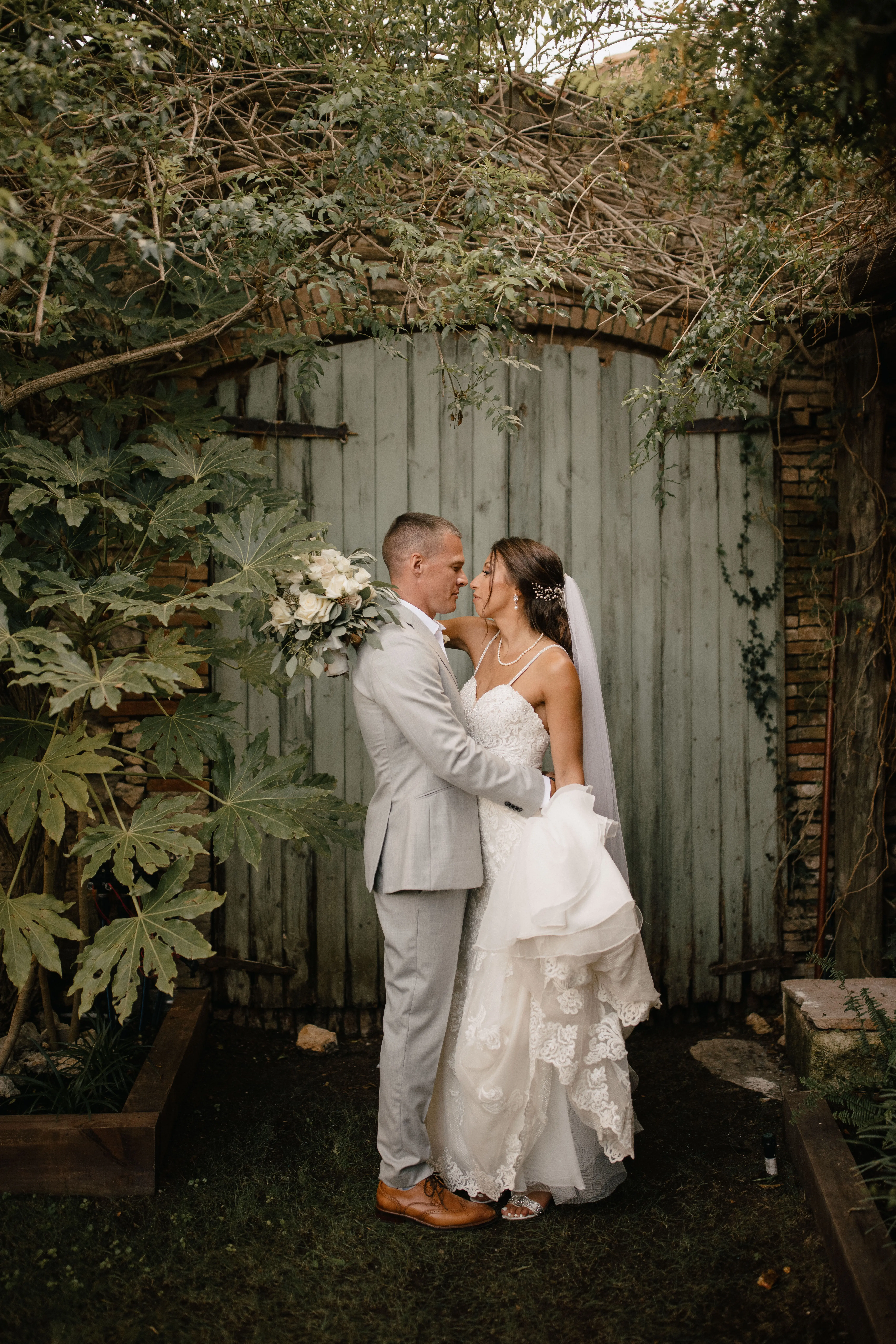 Groom with Bride in Sparkly Lace Fit-and-Flare Bridal Dress Called Fiona by Maggie Sottero