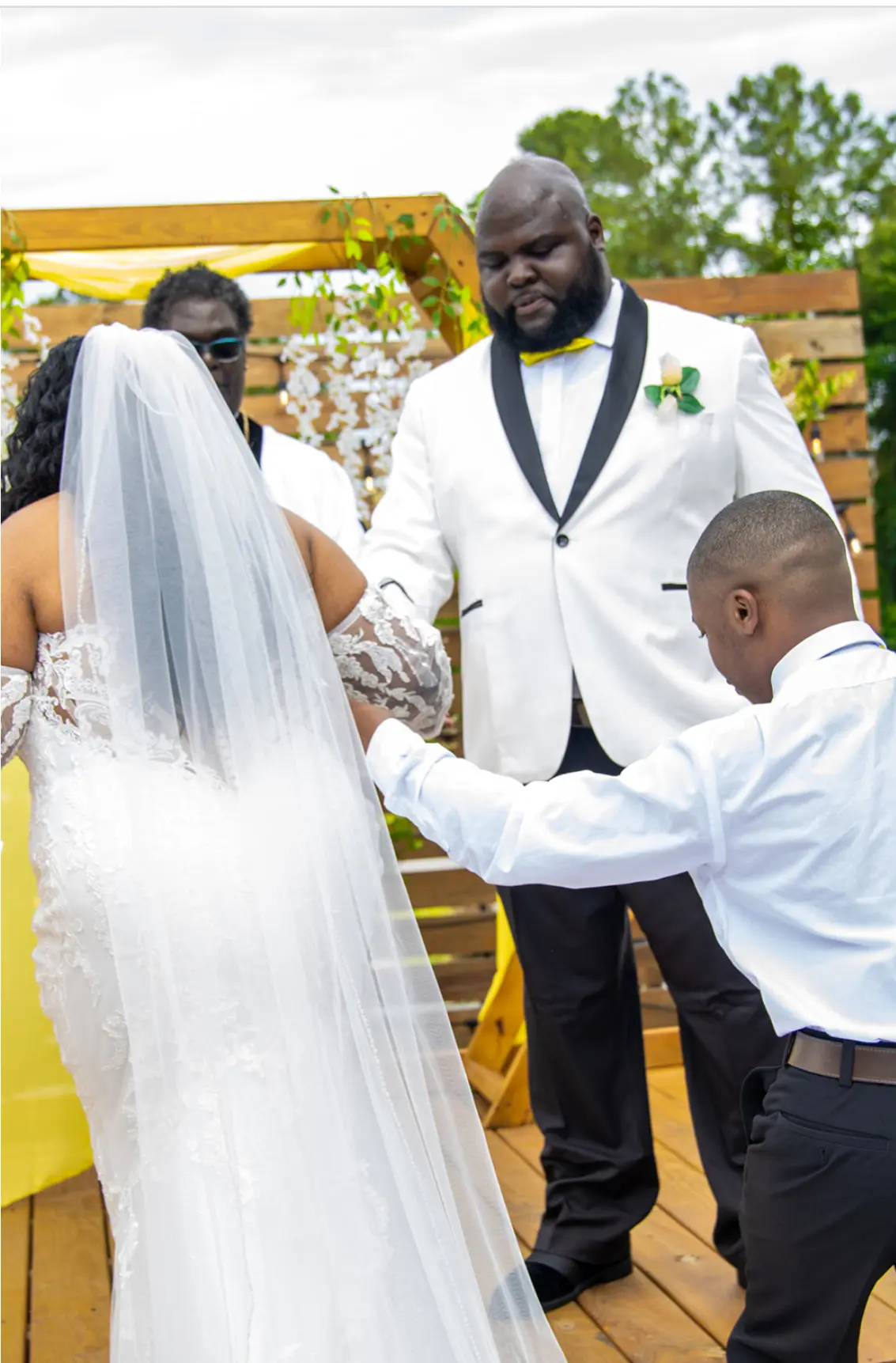 Bride wearing Frederique Royale by Maggie Sottero during her ceremony