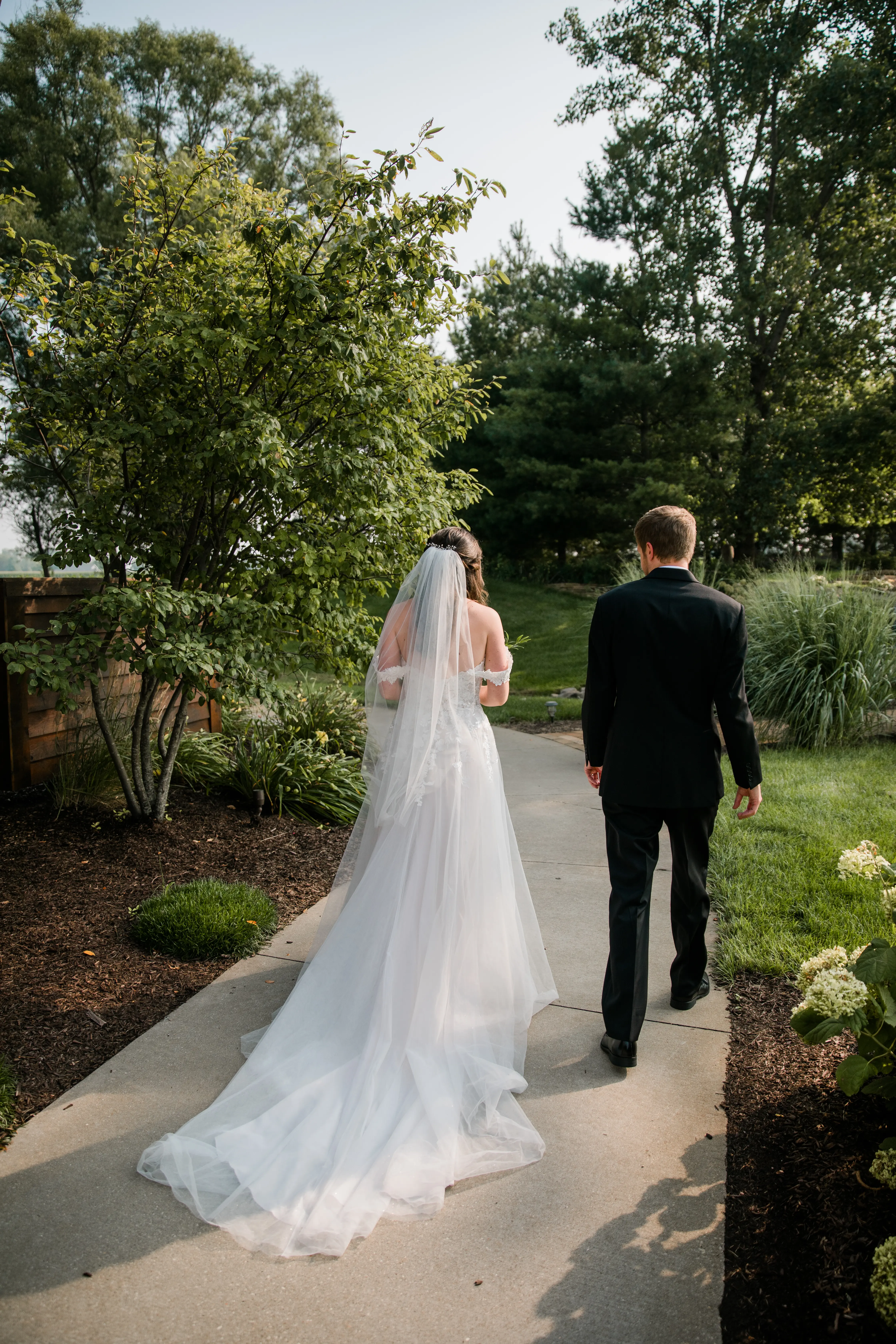 Groom With Bride Wearing A-Line Lace Wedding Dress With Customized Off The Shoulder Sleeves Stevie By Maggie Sottero