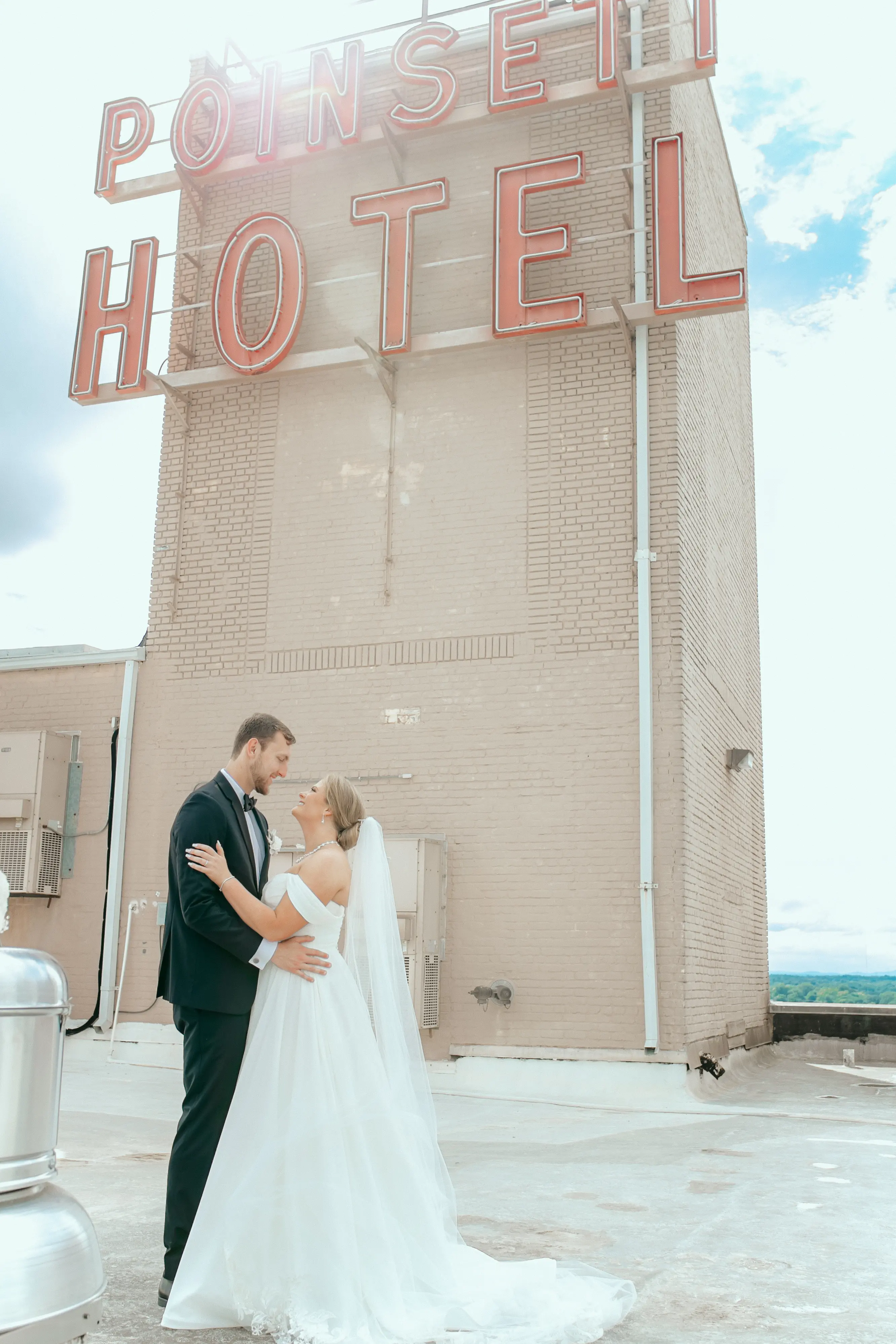 Bride wearing Anniston by Maggie Sottero outside their hotel venue