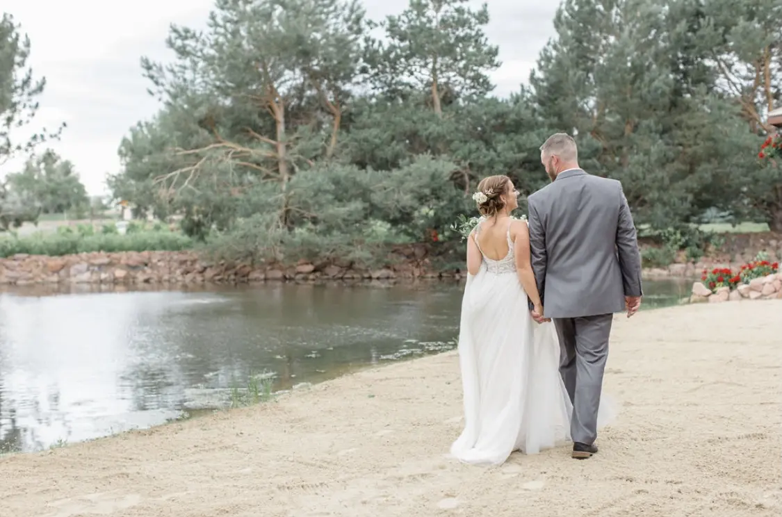 Groom With Bride Wearing Relaxed A-Line Wedding Dress Called Charlene By Maggie Sottero