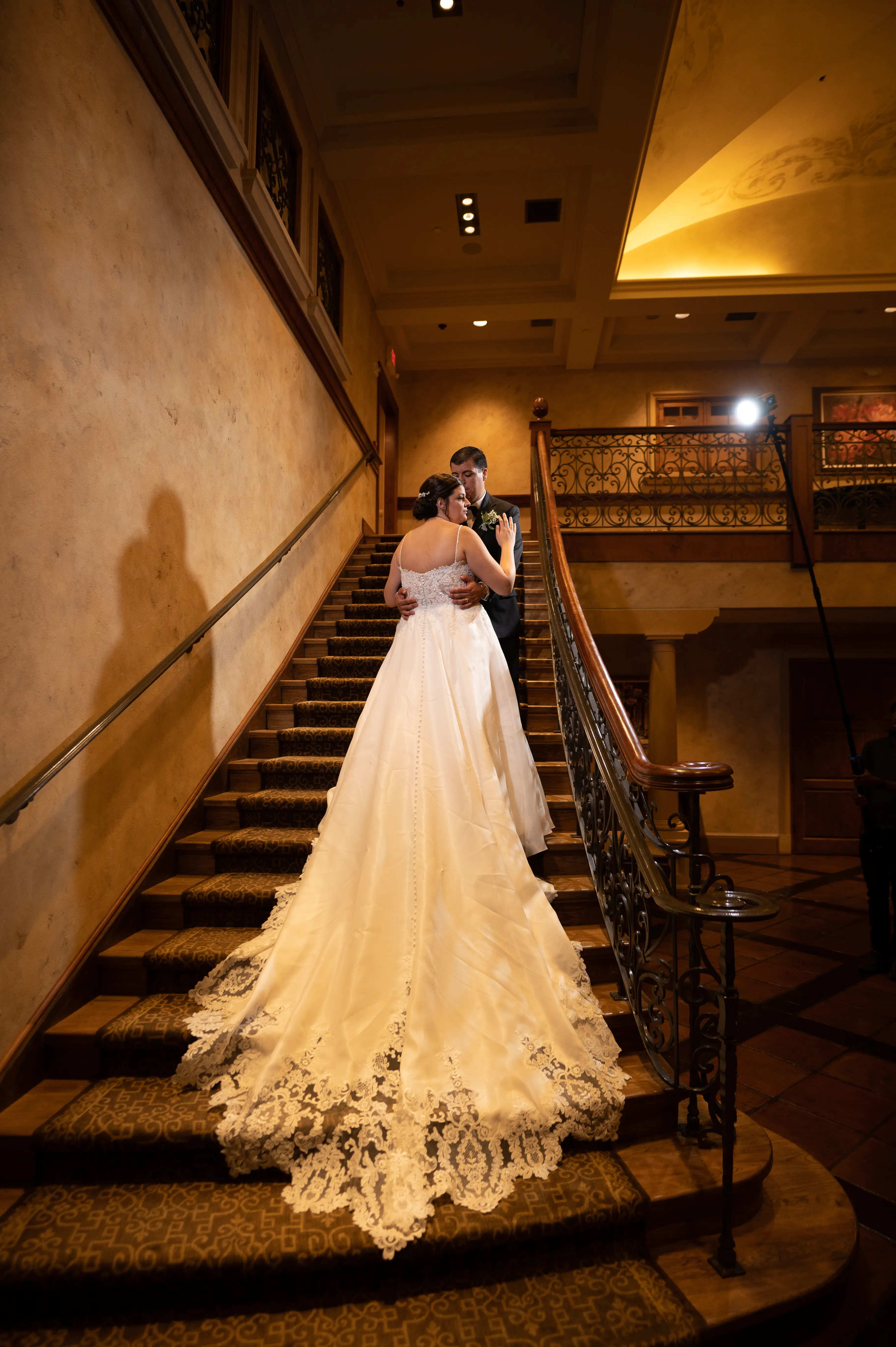 Bride In A-line Wedding Dress Named Savannah By Maggie Sottero Bride And Groom On Stairs