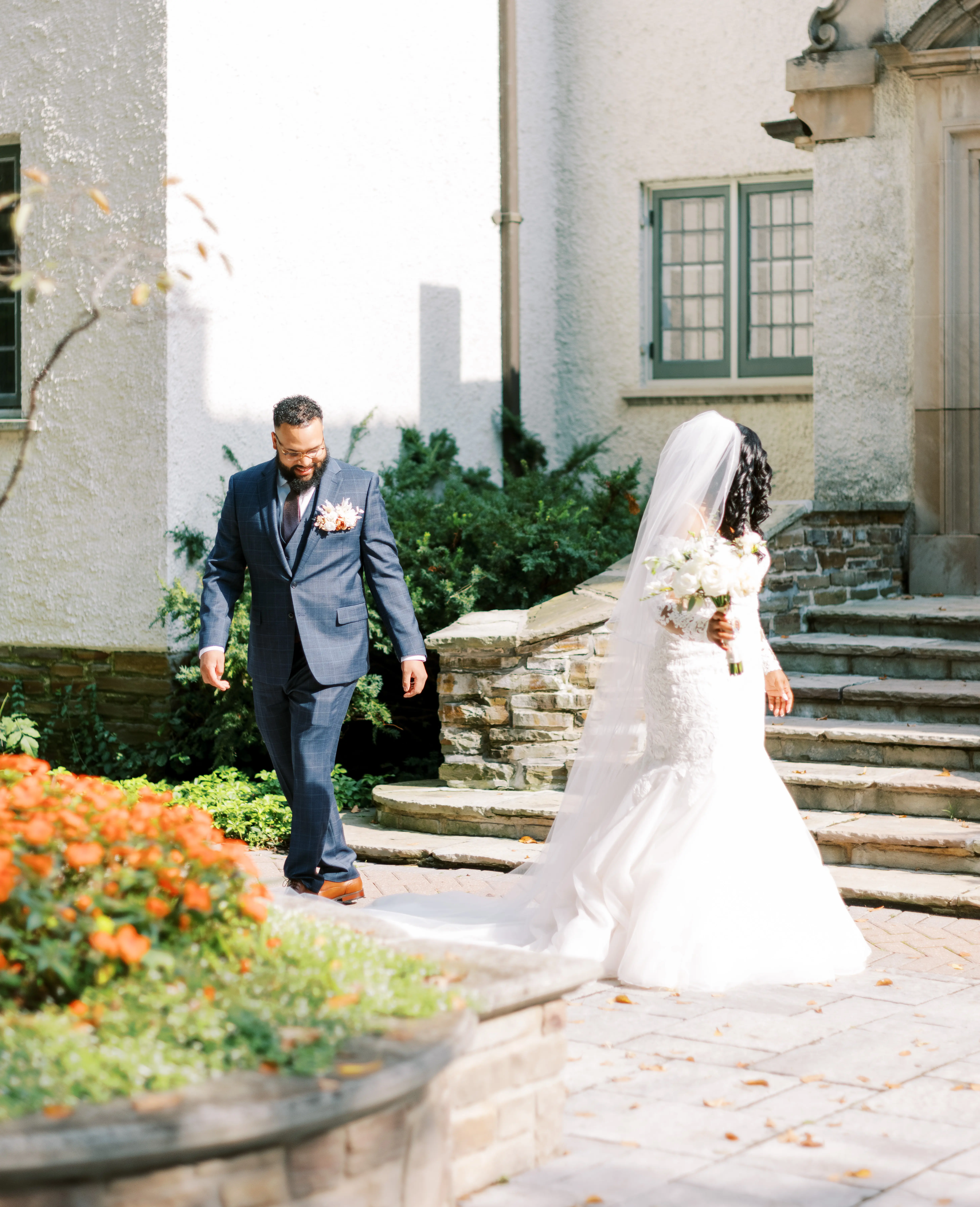 Bride wearing Sydney wedding dress by Maggie Sottero walking with the groom