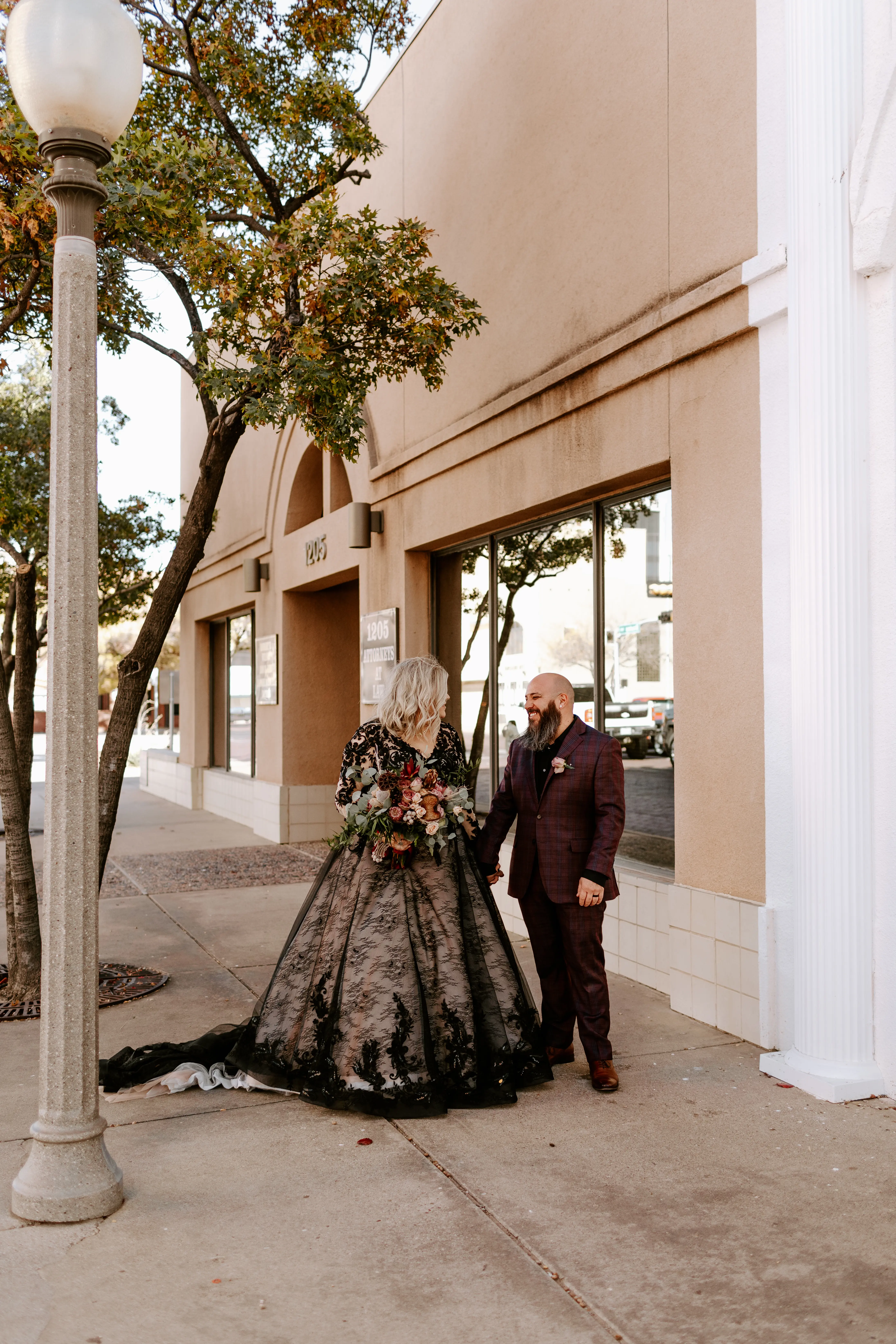 Bride Wearing Black Lace Wedding Dress Called Zander By Sottero And Midgley With Groom