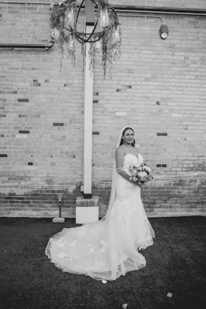 Bride in mermaid wedding dress called hattie by rebecca ingram