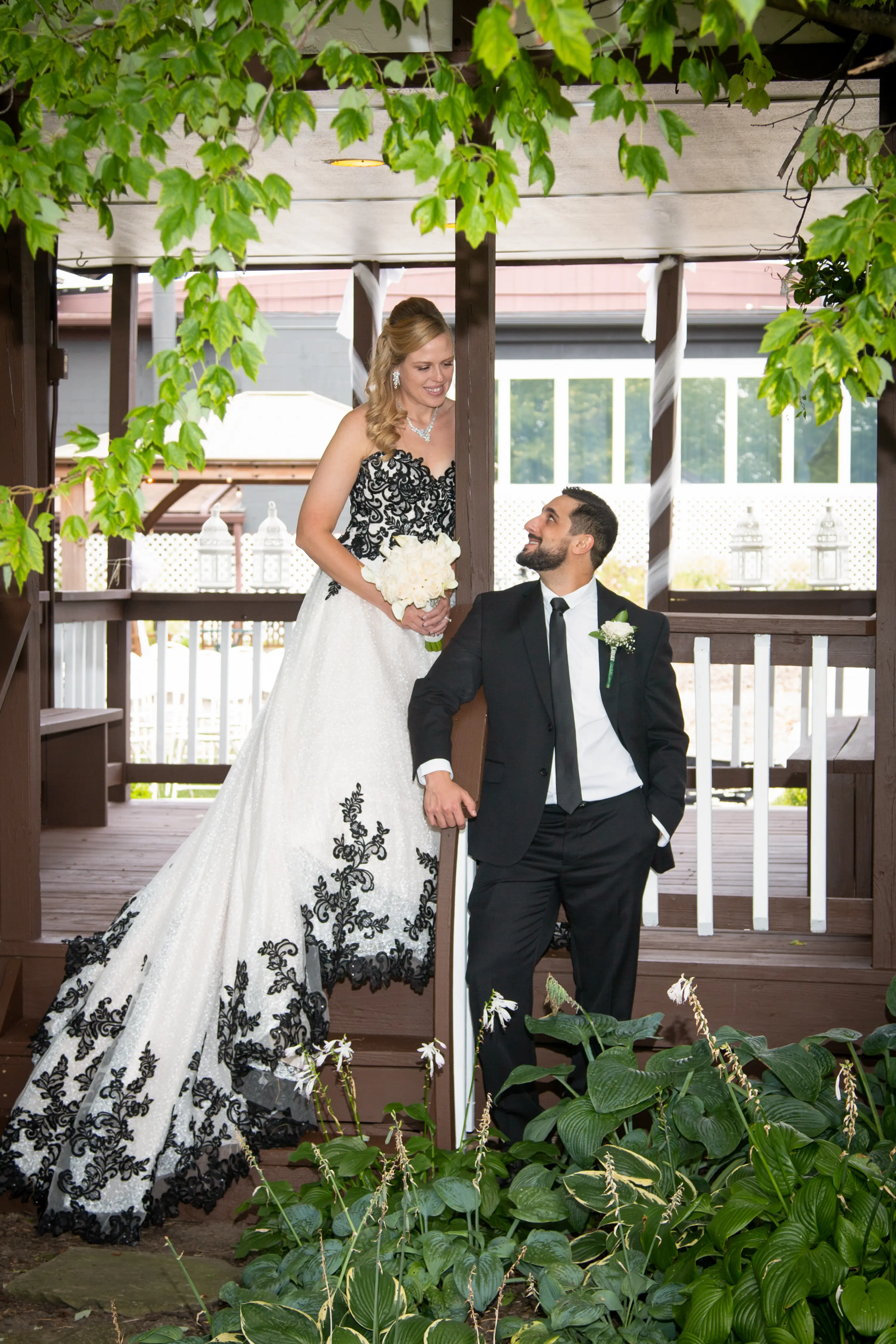 Bride Wearing A-Line Black Lace Wedding Dress Called Tristyn By Maggie Sottero With Groom