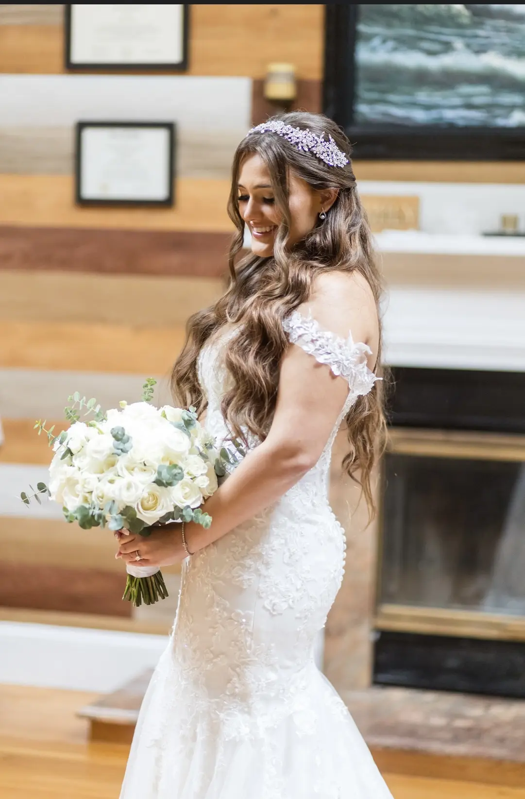 Bride wearing Lennon wedding dress by Maggie Sottero holding bouquet