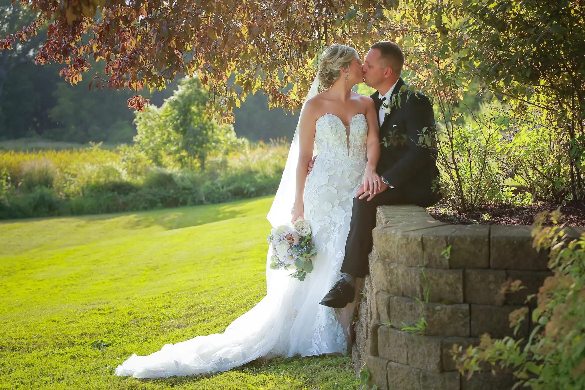Groom With Bride Wearing Mermaid Wedding Dress With Oversized Floral Lace Hattie By Rebecca Ingram