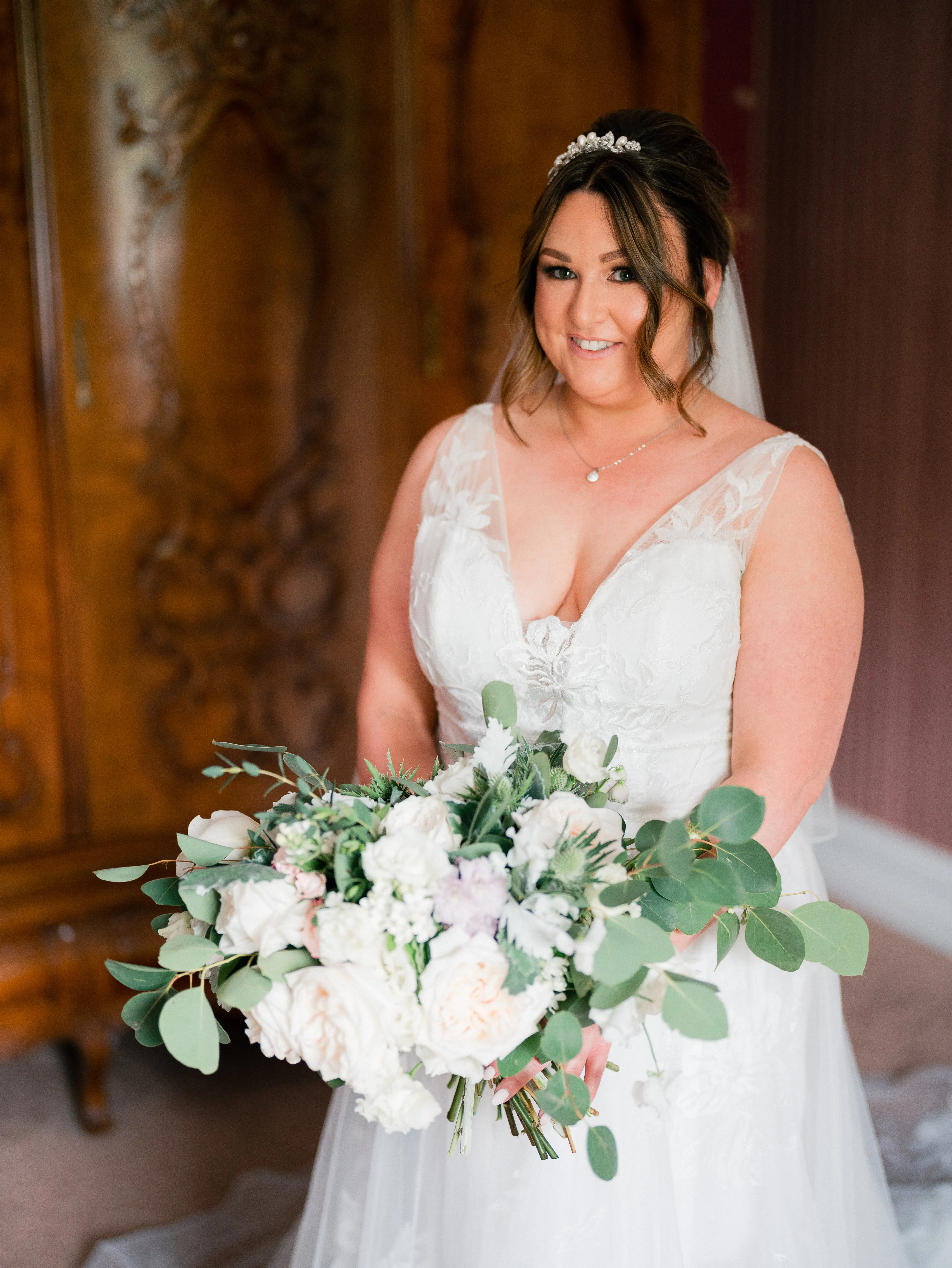 Real Bride in A-Line Wedding Gown with Lace Motifs Over Tulle and Beaded Lace Bodice Embellished with Swarovski Crystals Called Priscilla by Rebecca Ingram