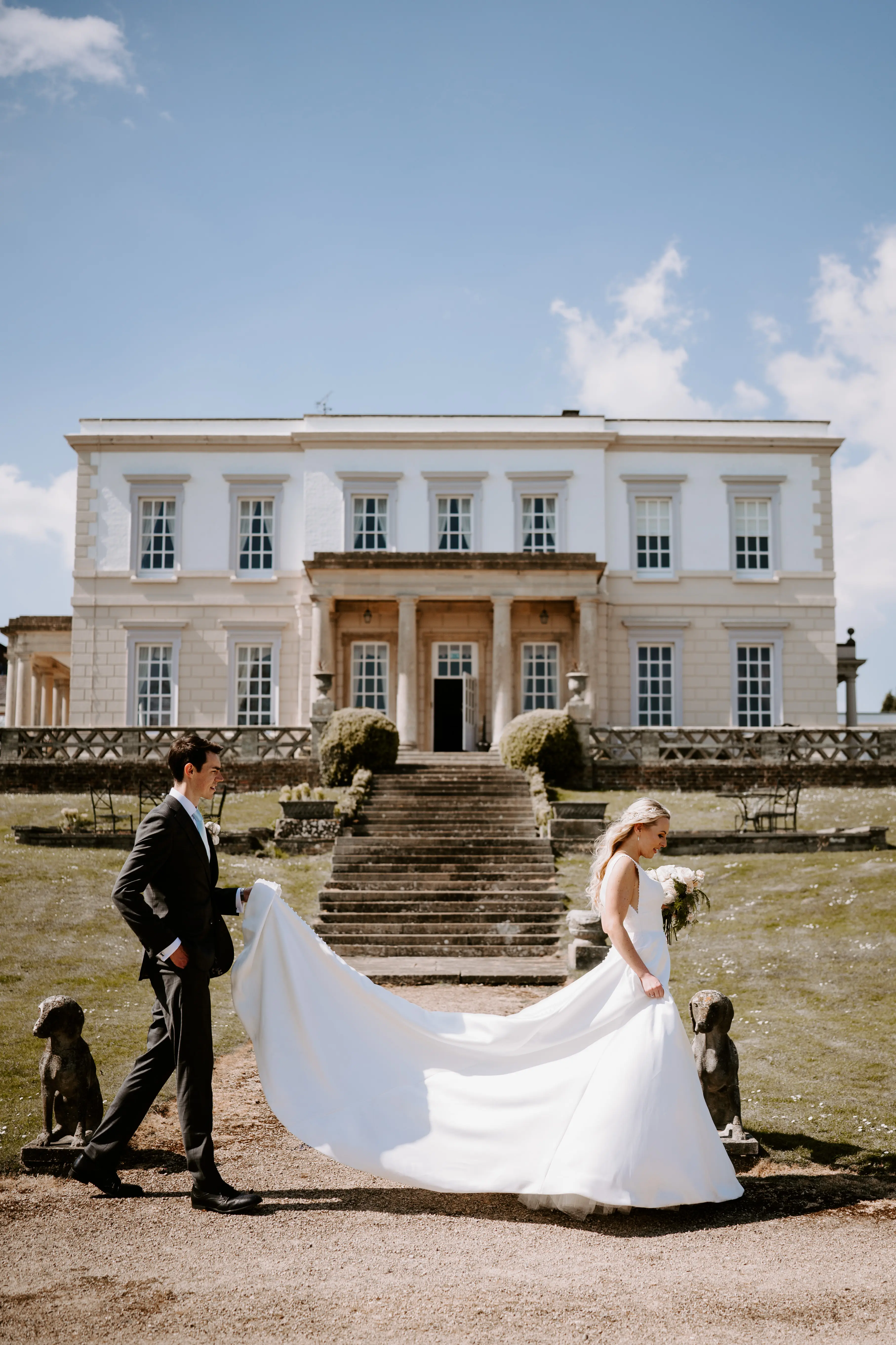 Groom With Bride Wearing Mikado A-Line Wedding Dress Raven By Maggie Sottero