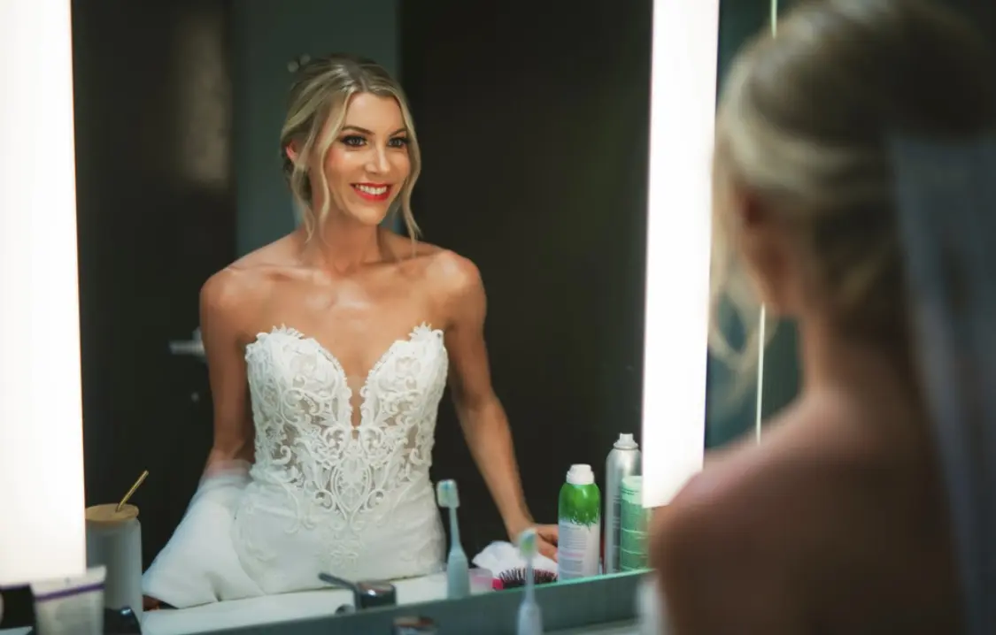 Real Bride in Fit-and-Flare Strapless Chiffon Wedding Gown with Sequined Lace Motifs over Chantilly Lace with Corset Detailing Called Giovannetta by Sottero & Midgley