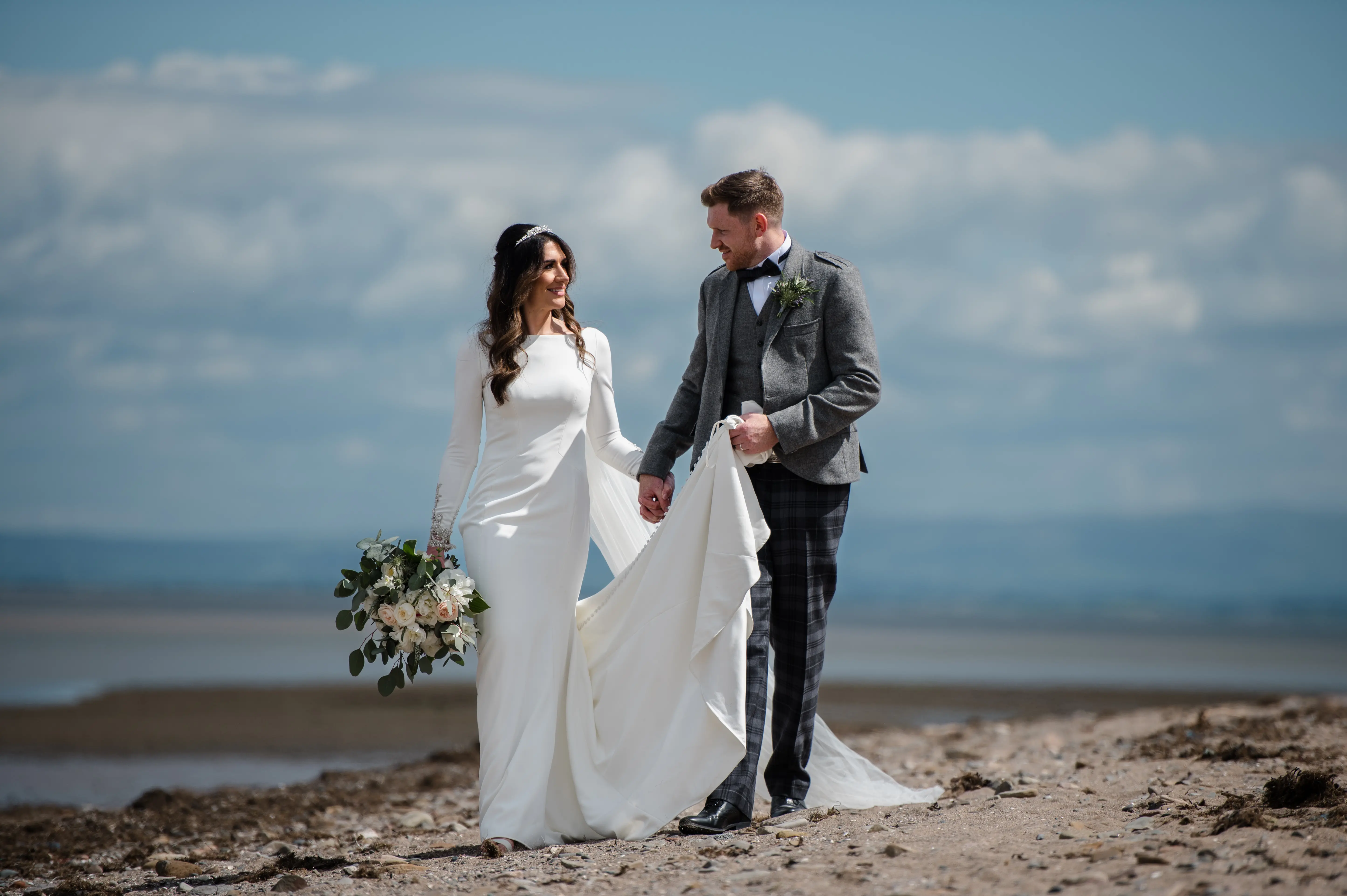 Real Bride in Crepe Fit-and-Flare Wedding Dress with a Statement Back of Beaded Illusion Embroidery Featuring Swarovski Crystals Called Aston by Sottero & Midgely