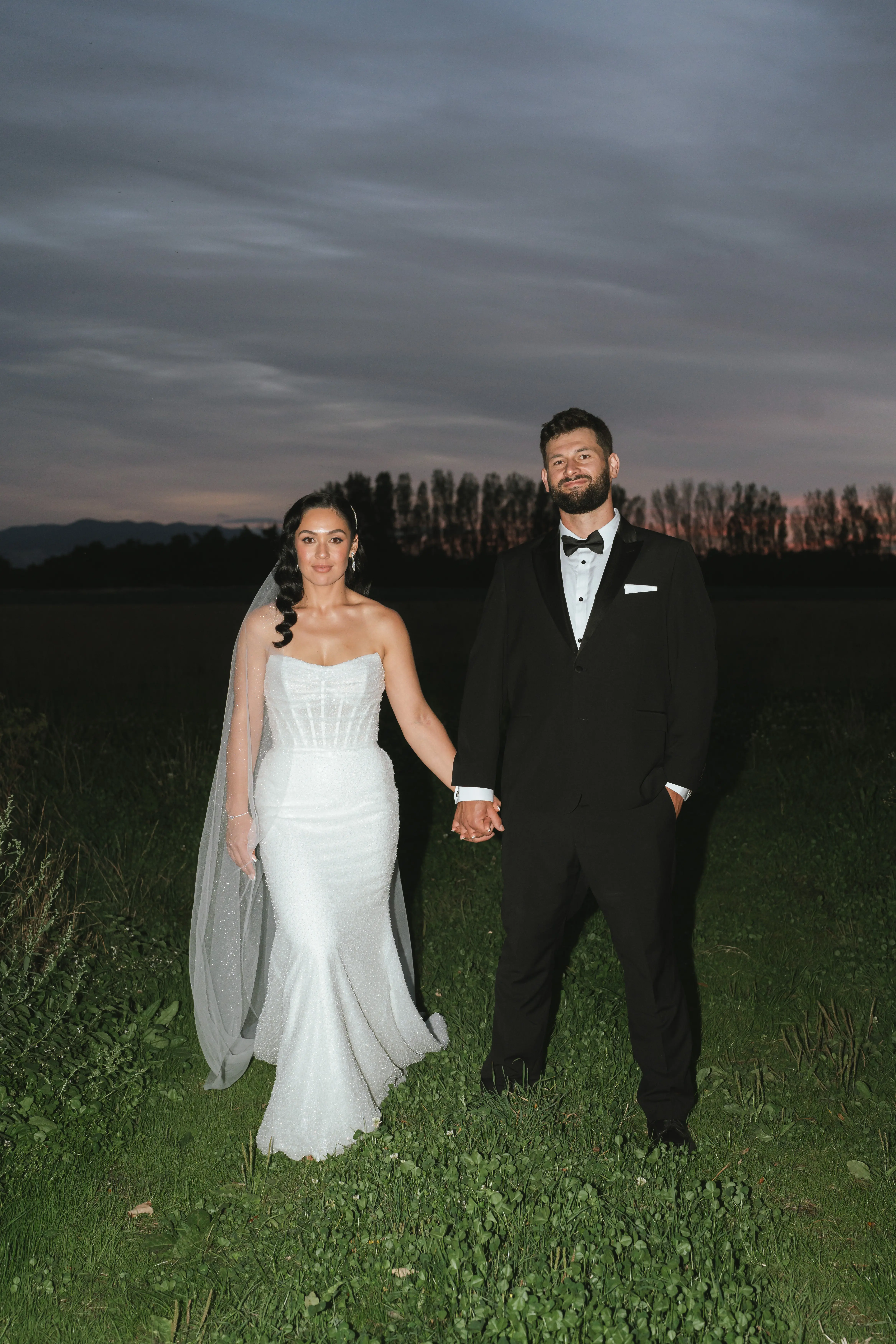 Bride wearing Drew by Maggie Sottero and her husband