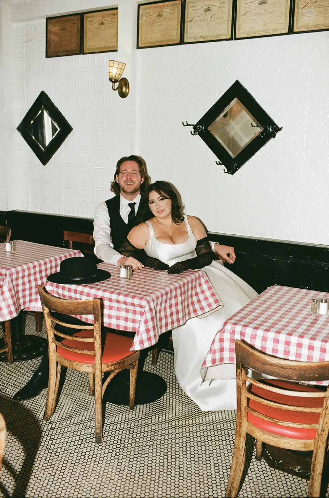 Bride Wearing Simple Aline Wedding Dress Called Selena By Maggie Sottero With Groom In An Old Italian Restaurant