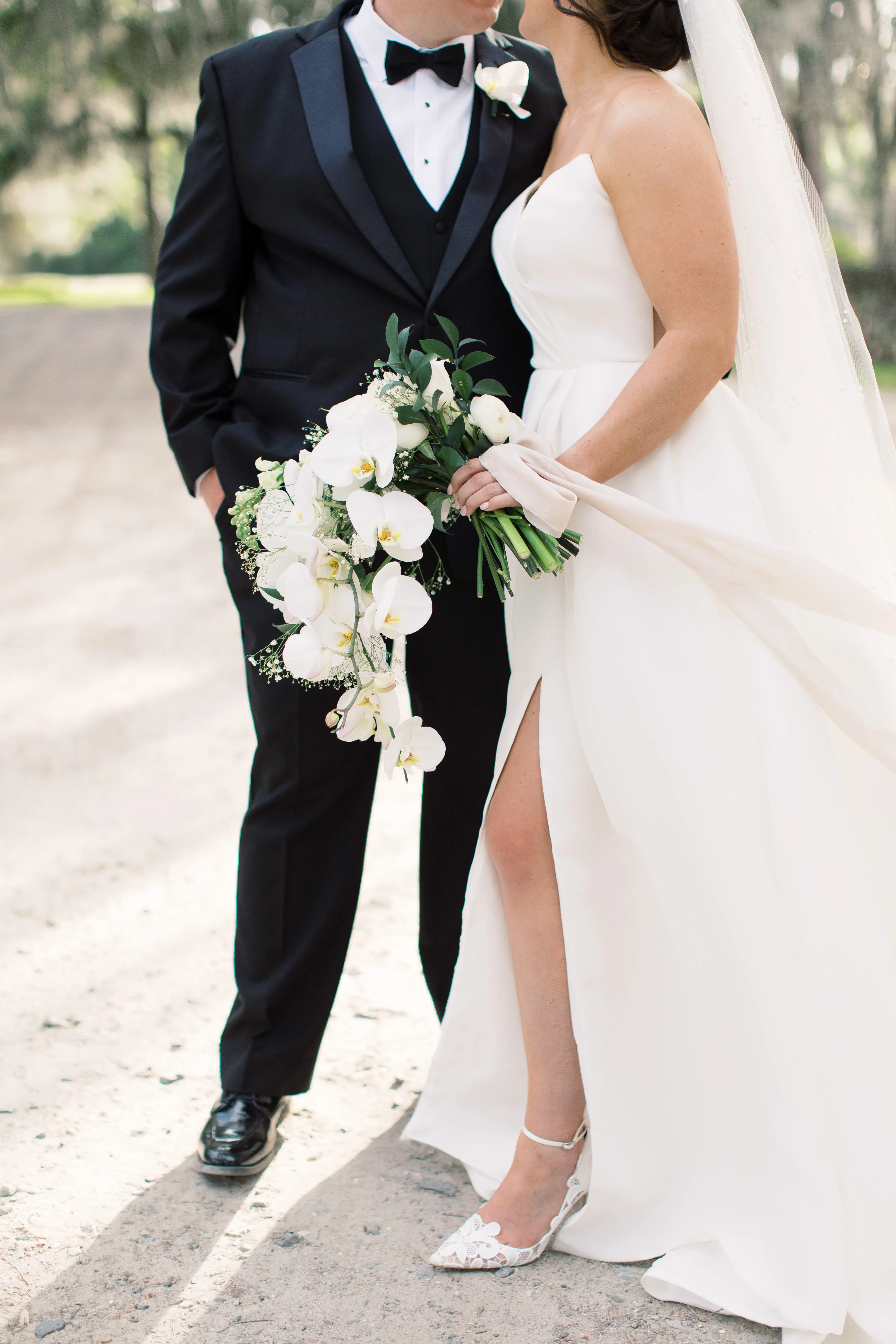 Bride wearing Nisha by Maggie Sottero with her husband