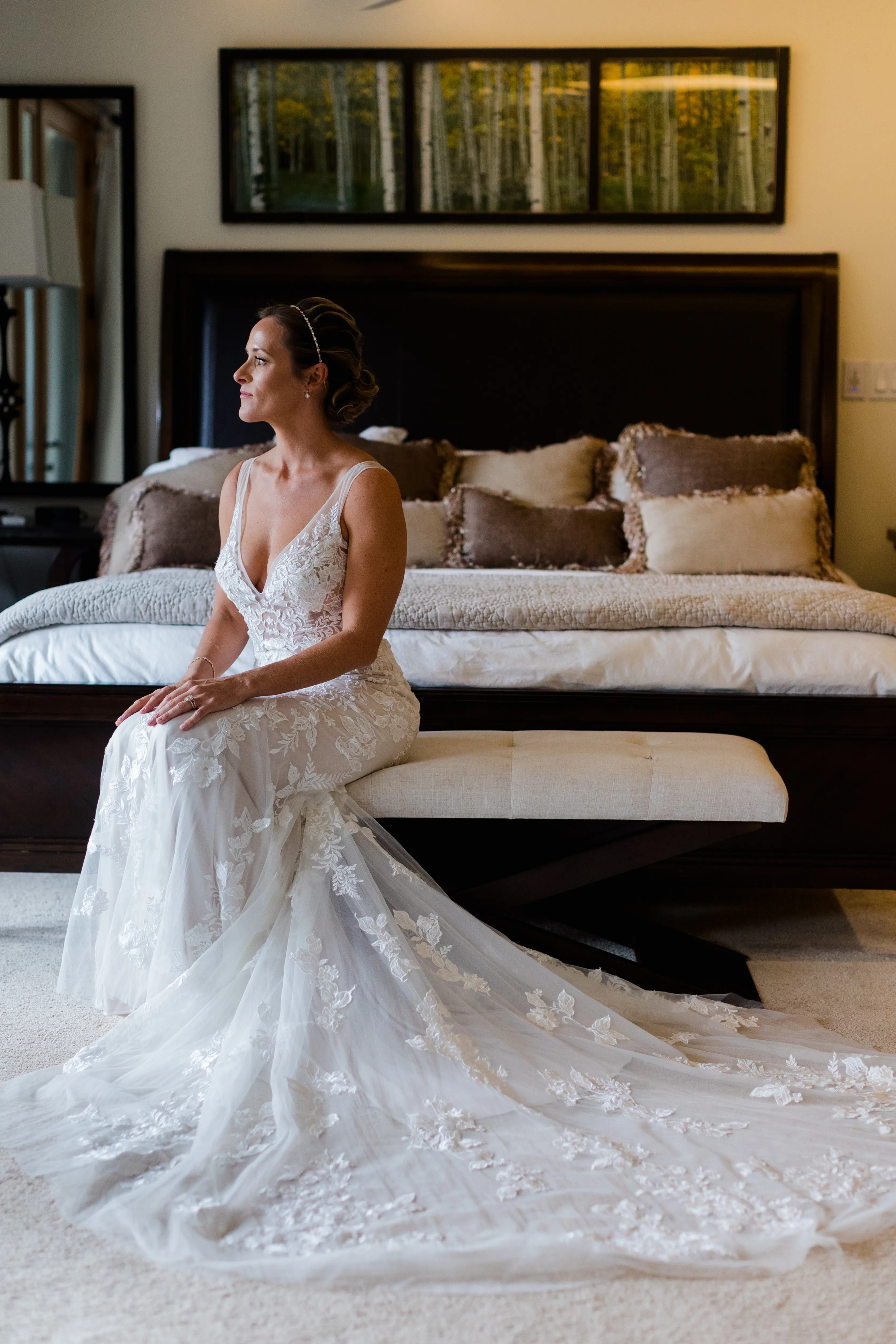 Bride sat down wearing wedding dress called Greenley.