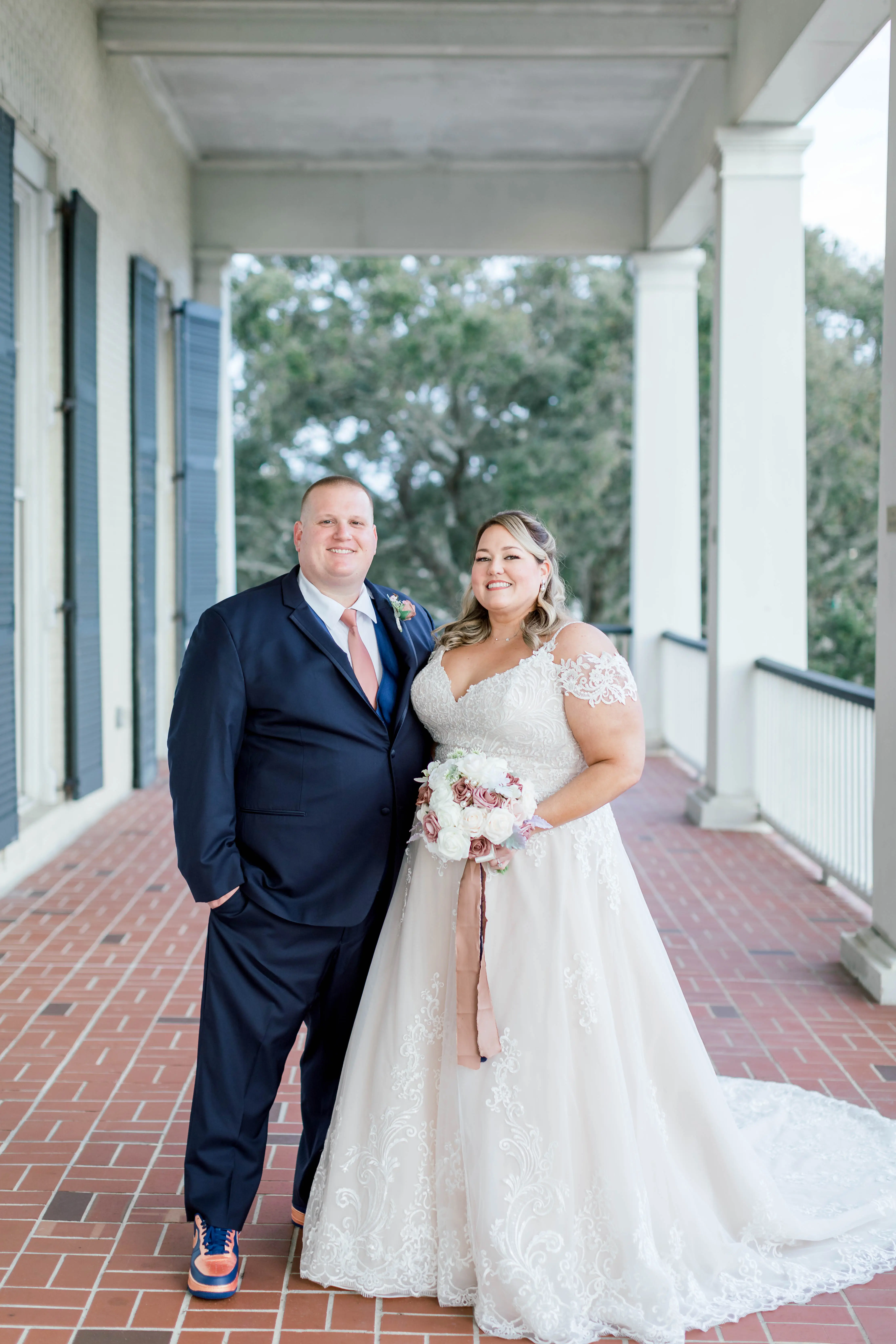 Groom with Bride Wearing A-Line Wedding Dress Called Wallis by Maggie Sottero
