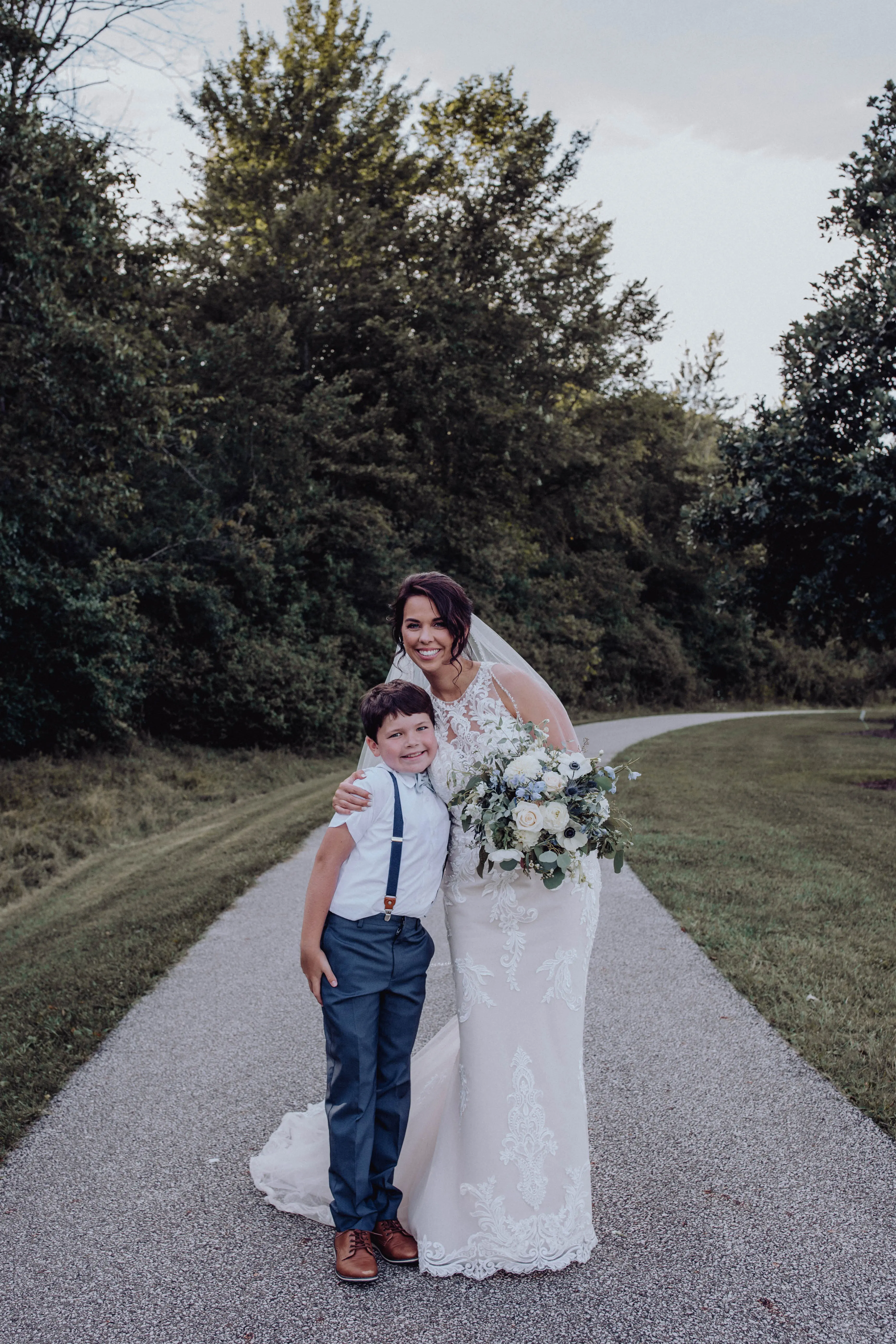 Bride wearing budget friendly fit and flare wedding dress
