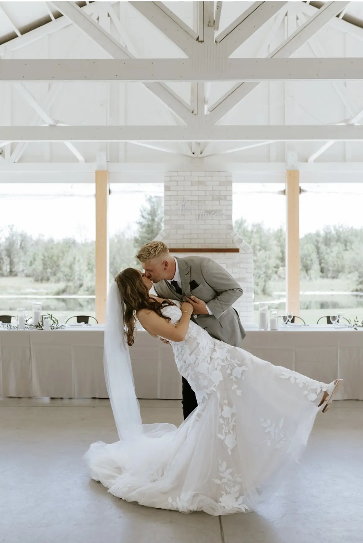 Groom With Bride Wearing Strapless Mermaid Wedding Dress Hattie By Rebecca Ingram
