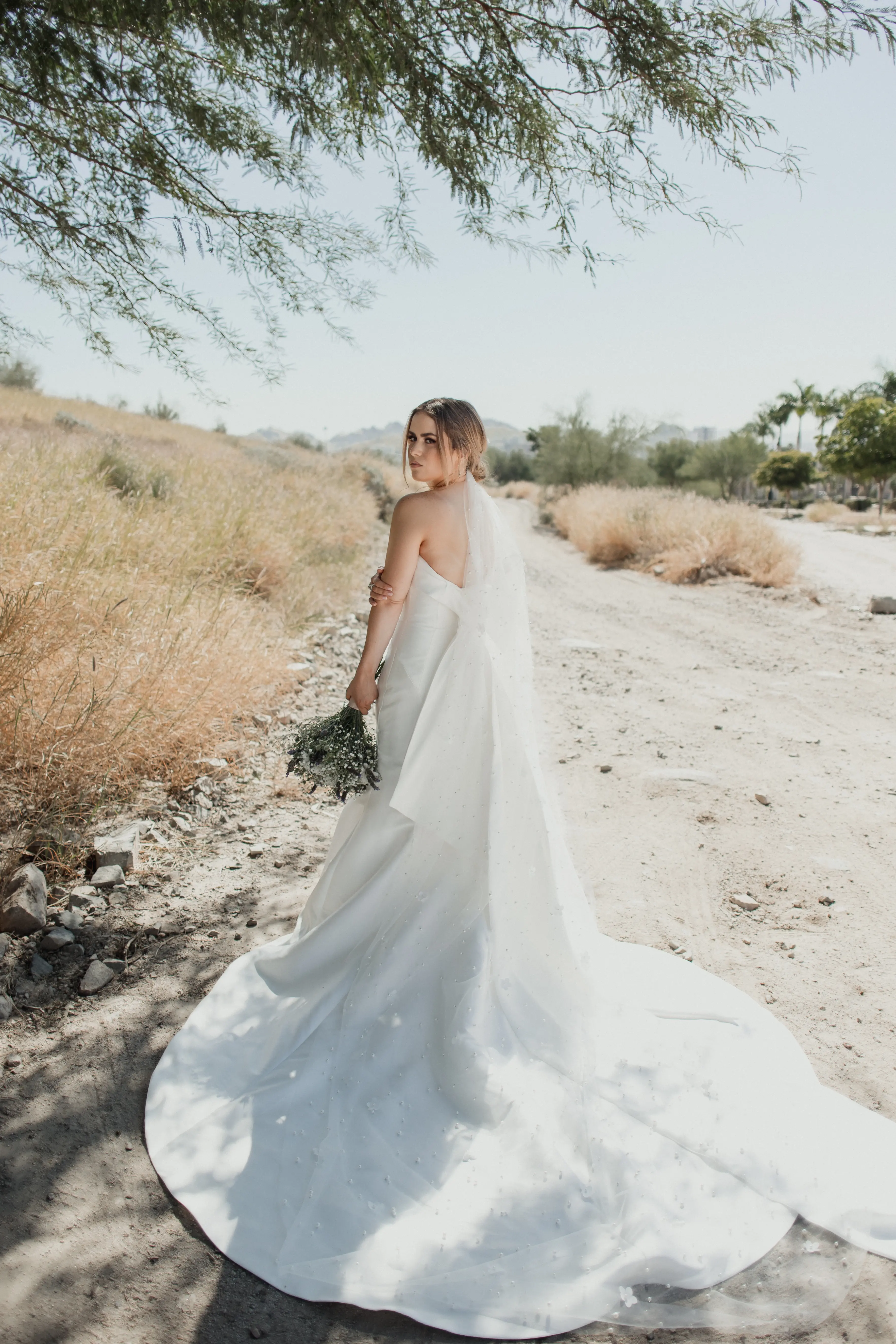 Bride In Modern Strapless Wedding Dress Called Mitchell By Maggie Sottero
