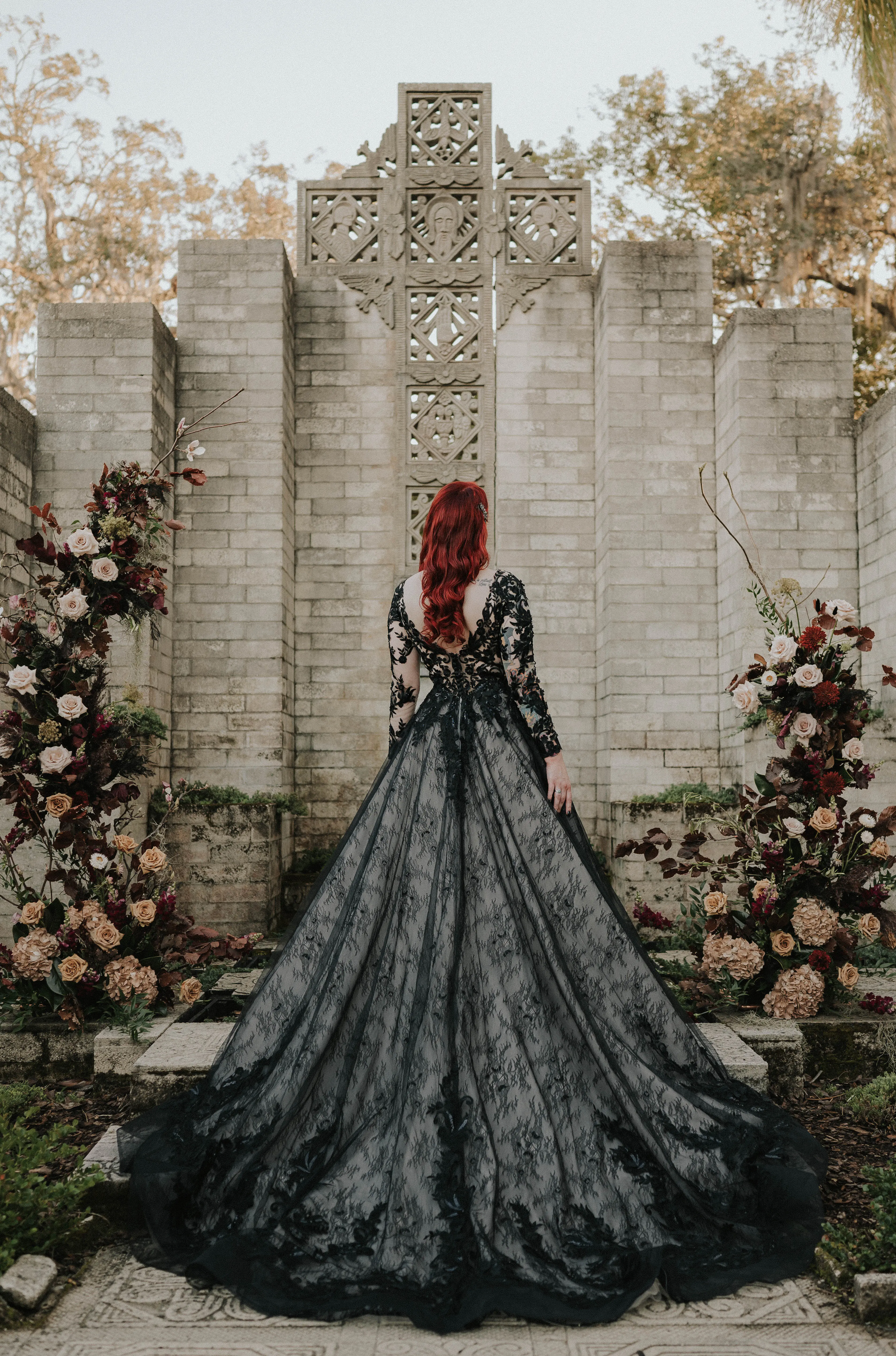Bride In Gothic Black Wedding Dress Called Zander By Sottero And Midgley With Floral Arch And Celtic Venue