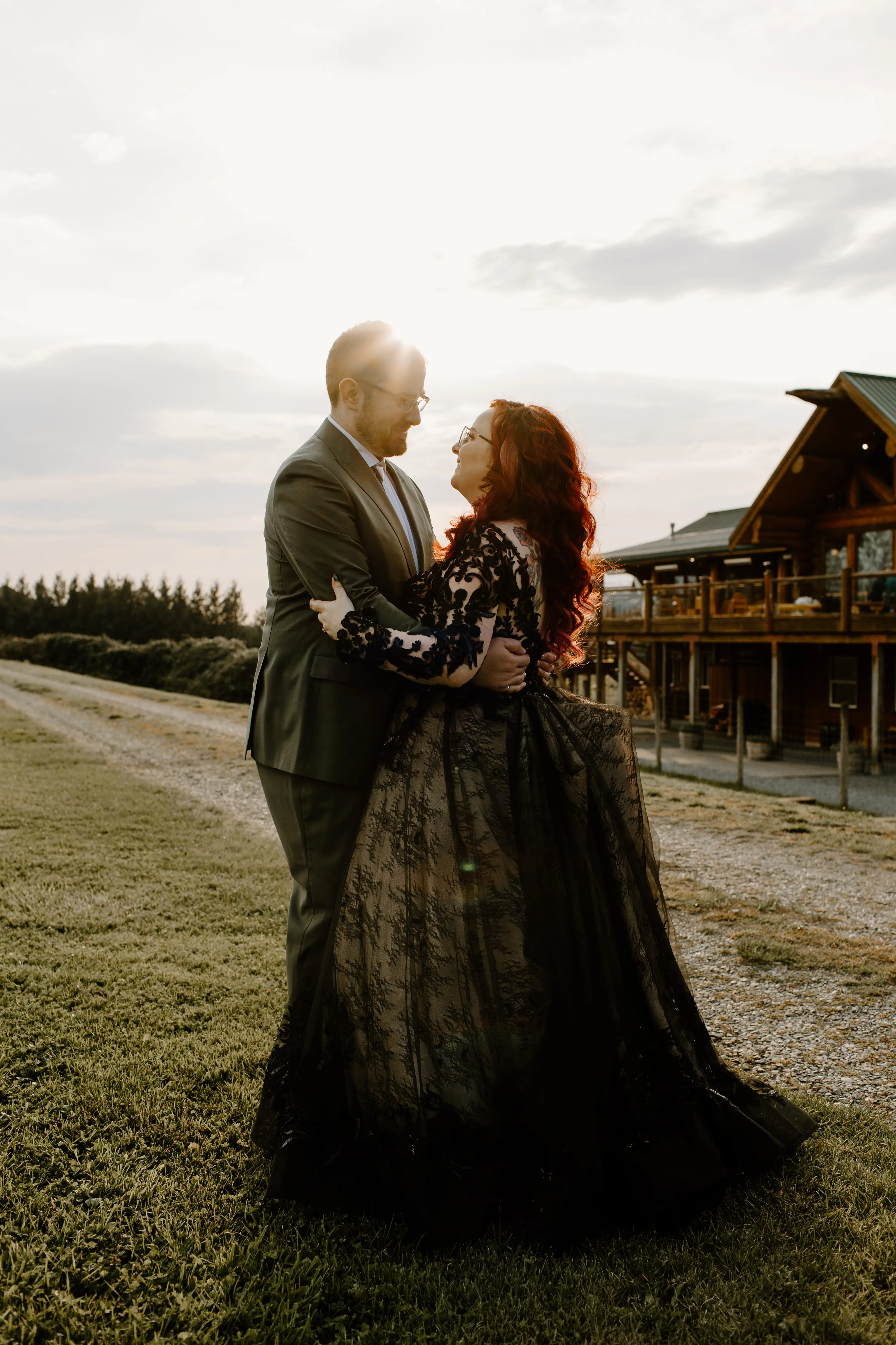 Bride Wearing Black Wedding Dress Zander By Sottero and Midgley Looking At Groom