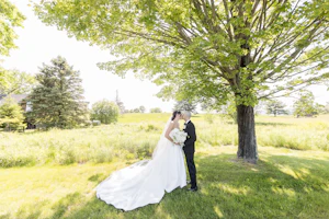 Bride In Sleeveless And Thigh-high Slit Aspen Sottero Midgley With Groom