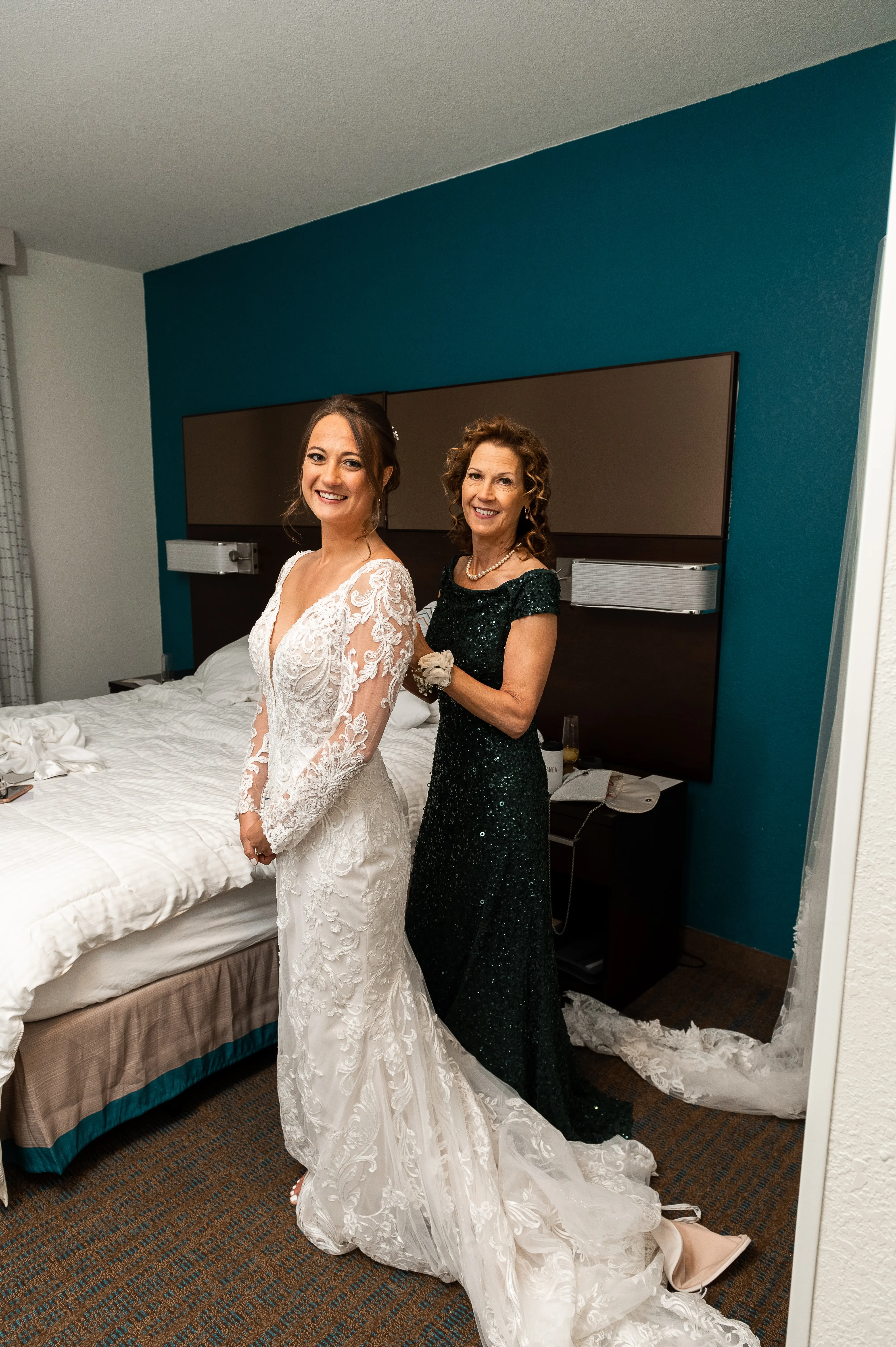Real Bride in Elegant Lace Sheath Bridal Dress with Beaded Lace Motifs and Scalloped Lace Train Called Hamilton by Sottero & Midgley