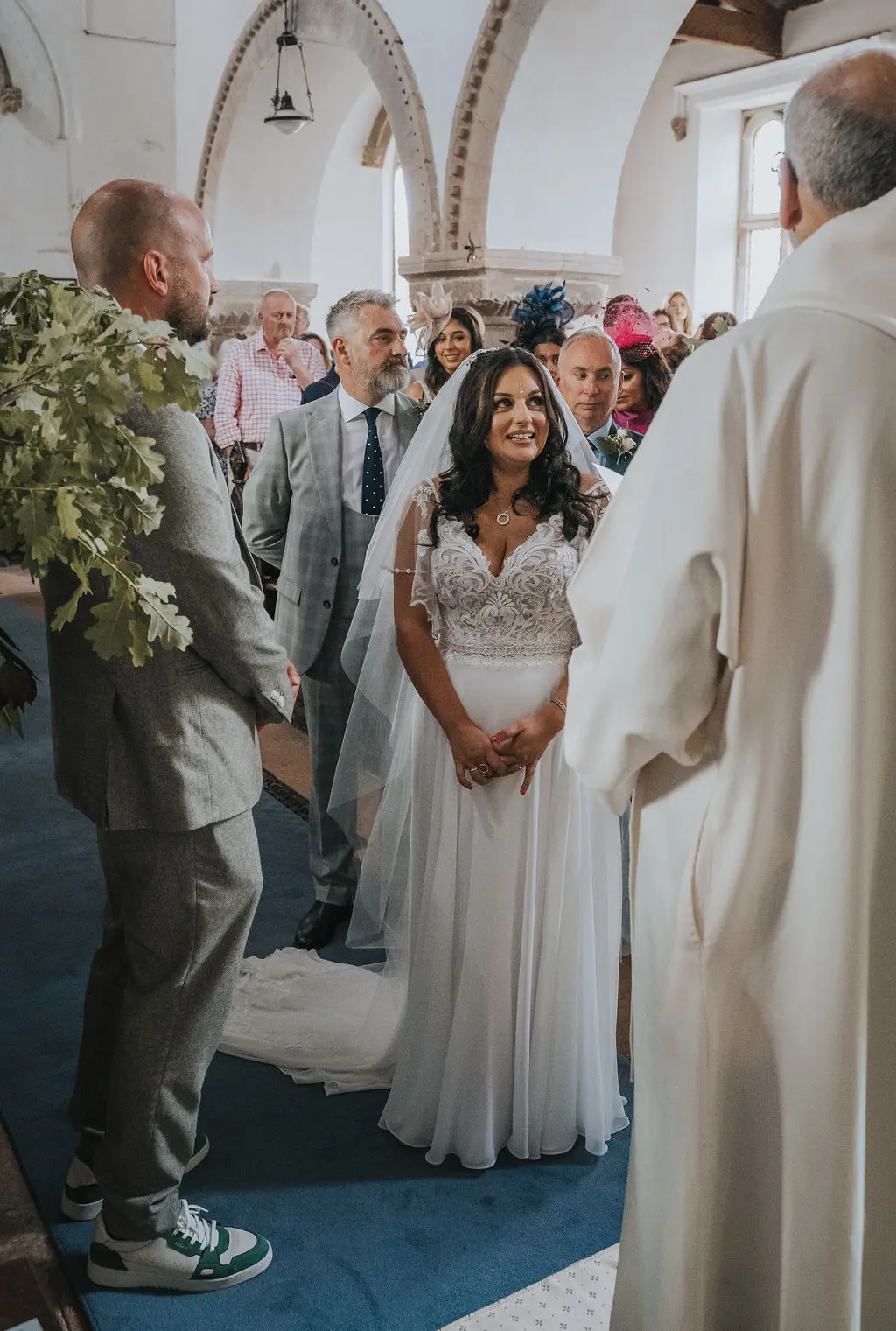Bride wearing Lorraine by Rebecca Ingram during her ceremony