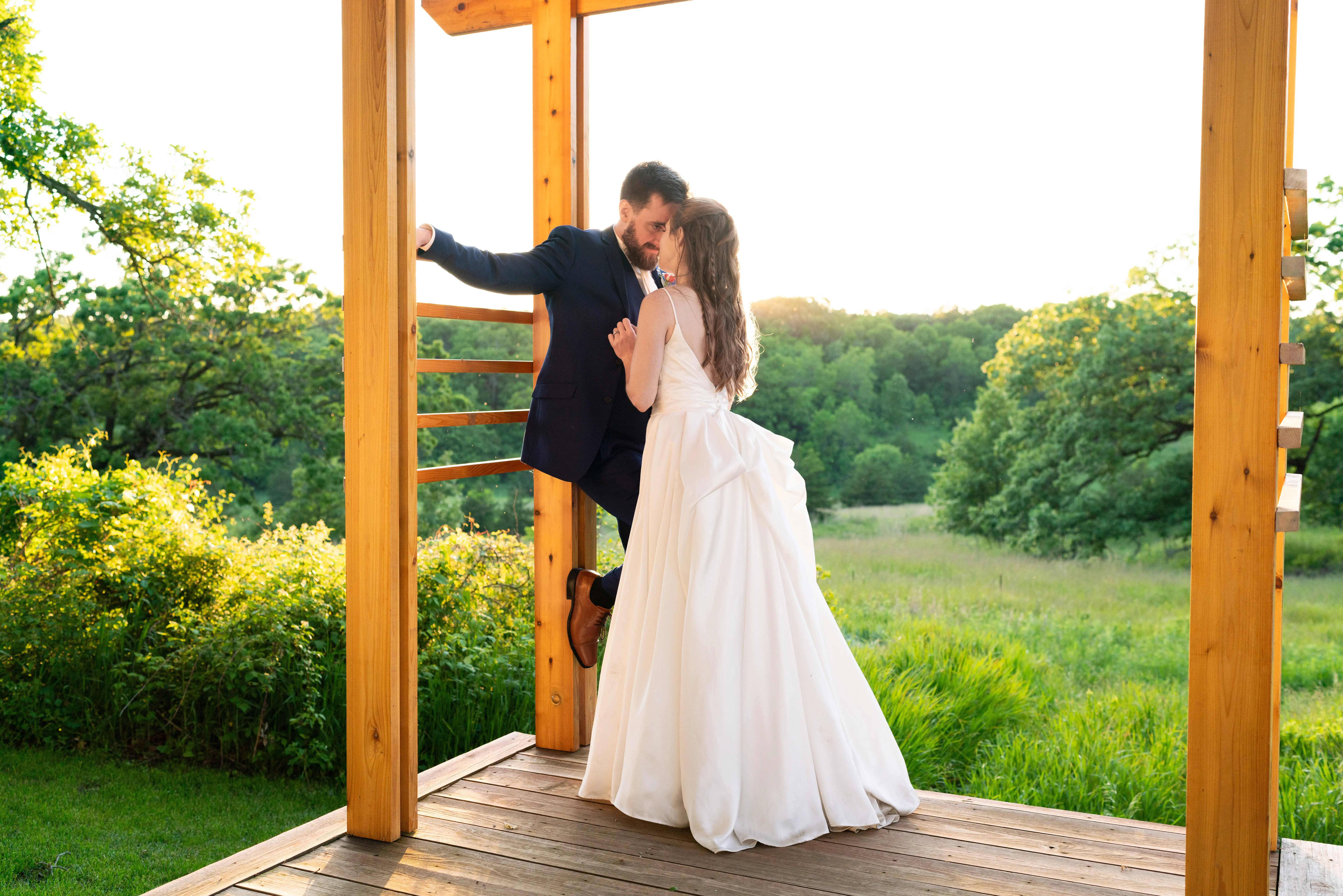 Bride wearing Scarlet by Maggie Sottero with her husband