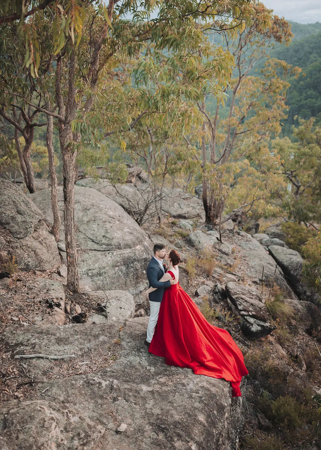 Bride In Red A-line Alera Sottero Midgley With Groom