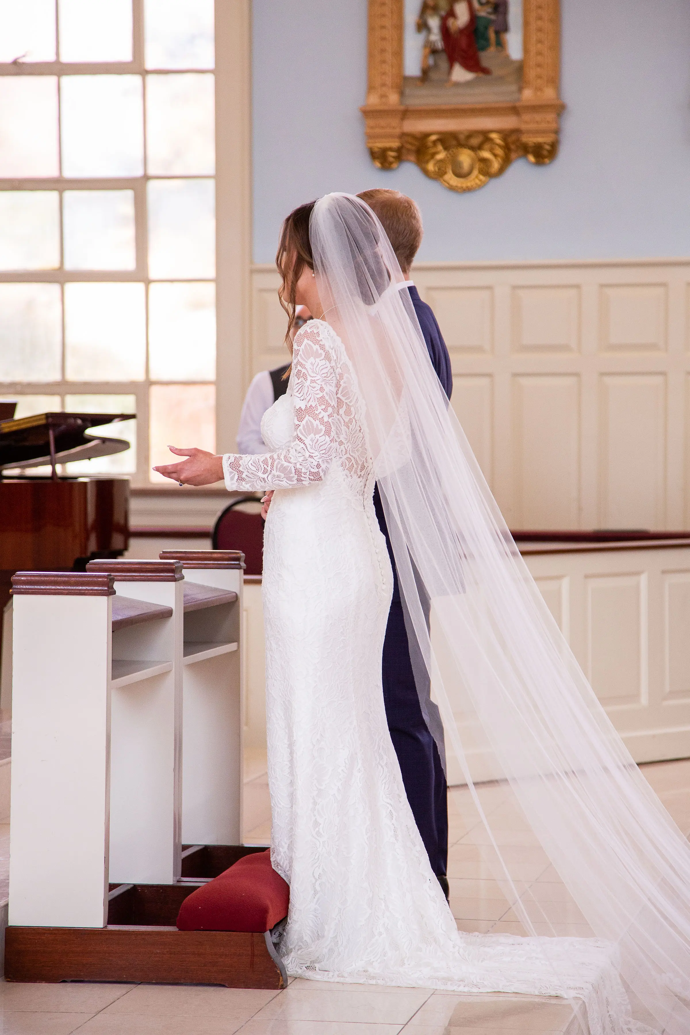Groom With Bride Wearing Long Sleeve Lace Form Fitting Wedding Dress Tina Dawn By Rebecca Ingram