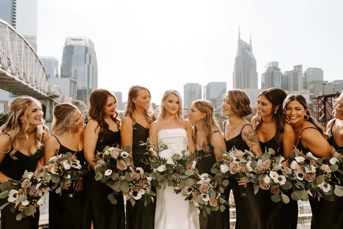 Bride Wearing Unique Strapless Wedding Dress With Beautiful Back Bow Mitchell By Maggie Sottero