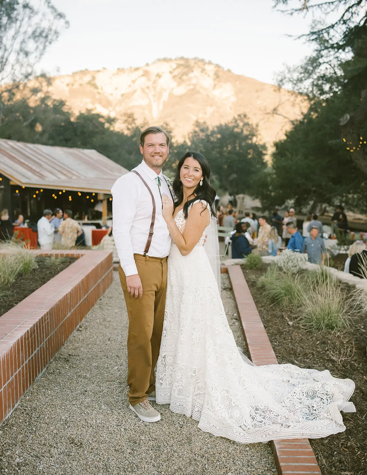 Groom with Bride in Vintage A-Line Wedding Dress with Allover Lace and Nude Underlay Called Finley Dawn by Sottero & Midgley