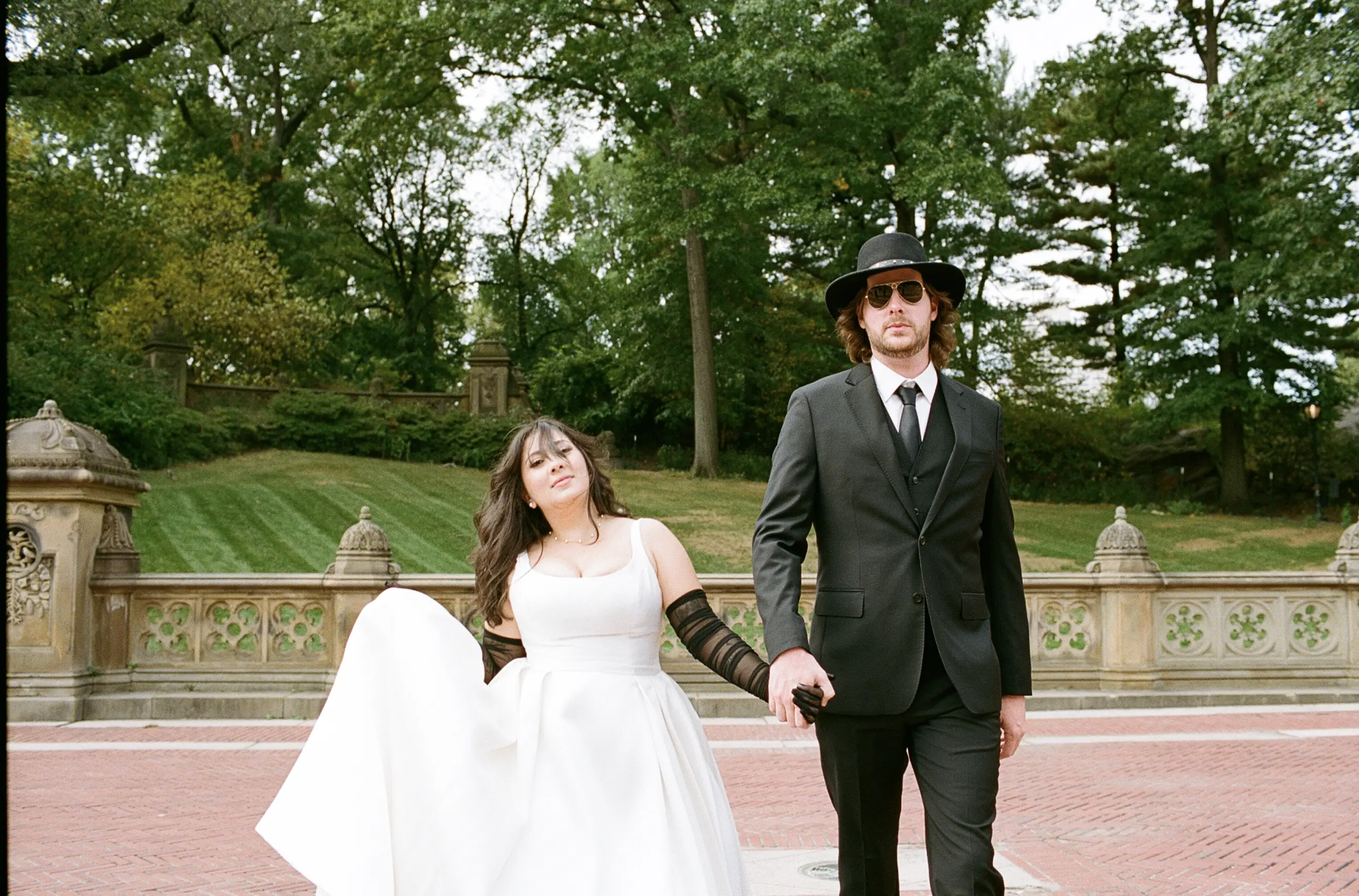 Bride Wearing Simple Aline Wedding Dress Called Selena By Maggie Sottero With Groom In A Park