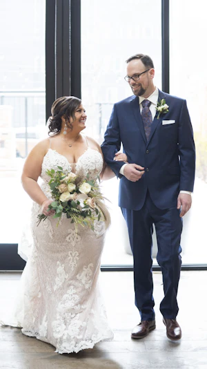 Bride Walking With Groom Wearing Wedding Dress Called Tuscany Marie by Maggie Sottero