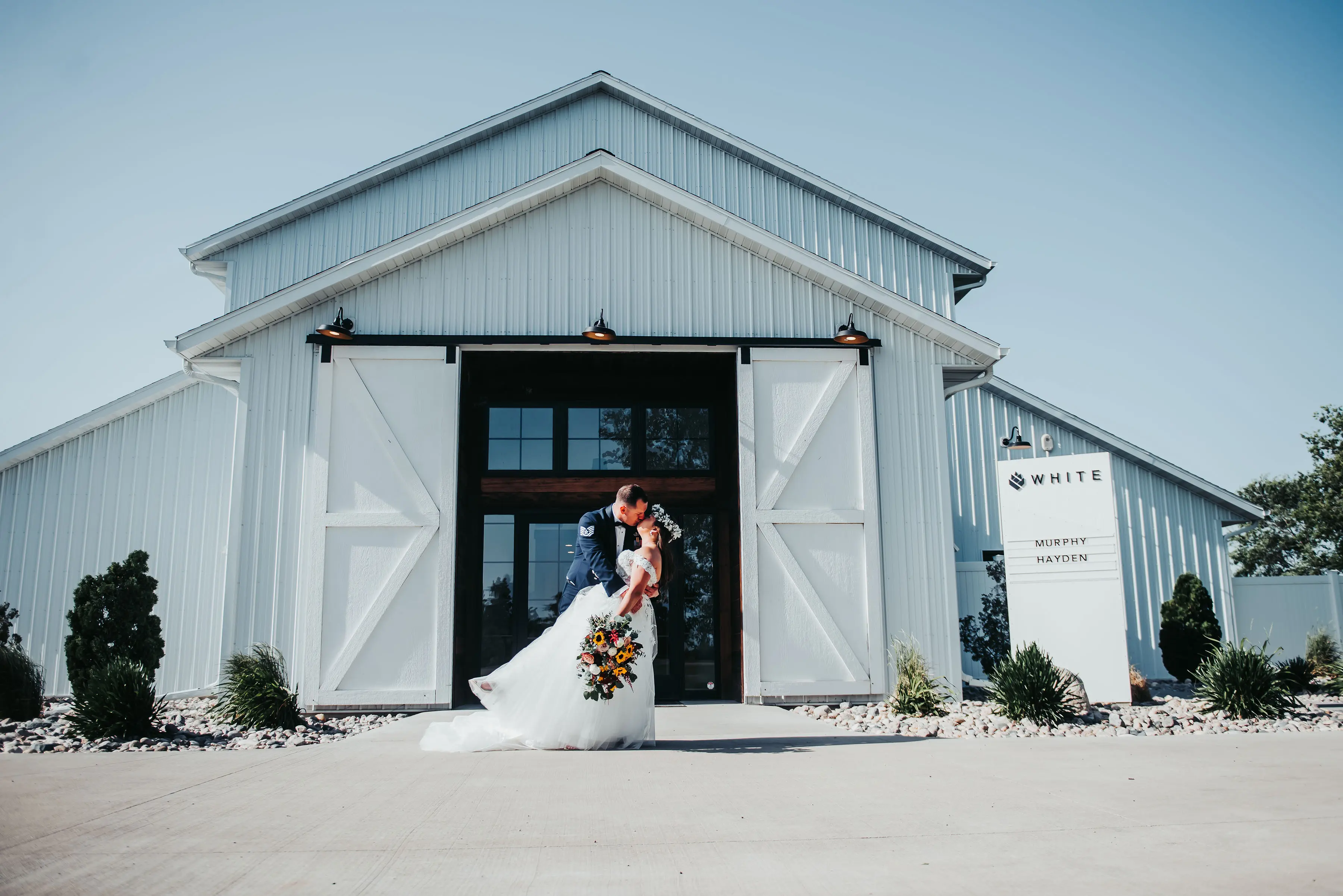Groom With Bride Wearing Strapless Floral Princess Wedding Dress Orlanda By Maggie Sottero