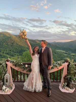 Groom With Bride Wearing Sheath Lace Wedding Dress Called Glorietta By Maggie Sottero