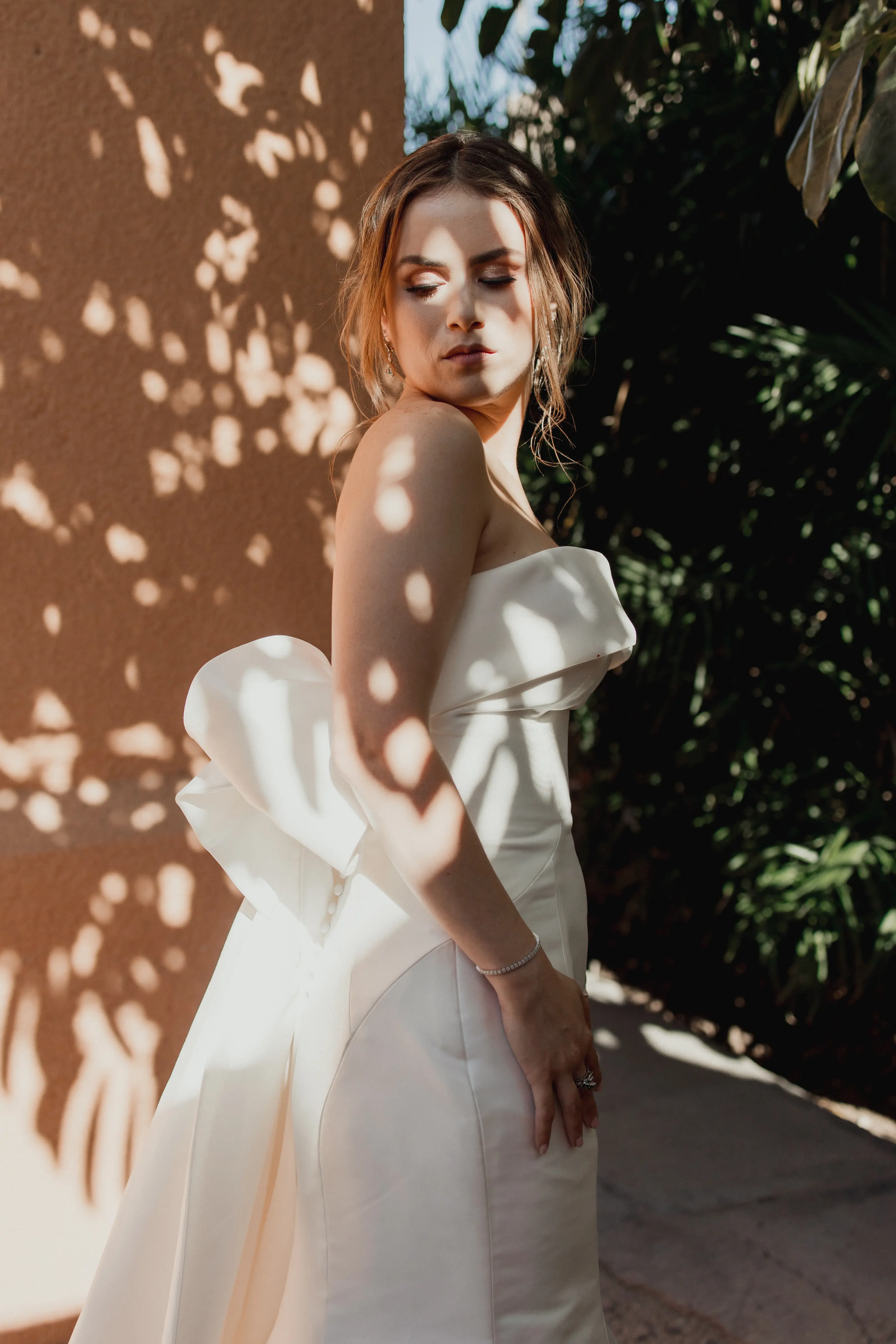 Bride In Modern Strapless Wedding Dress Called Mitchell By Maggie Sottero