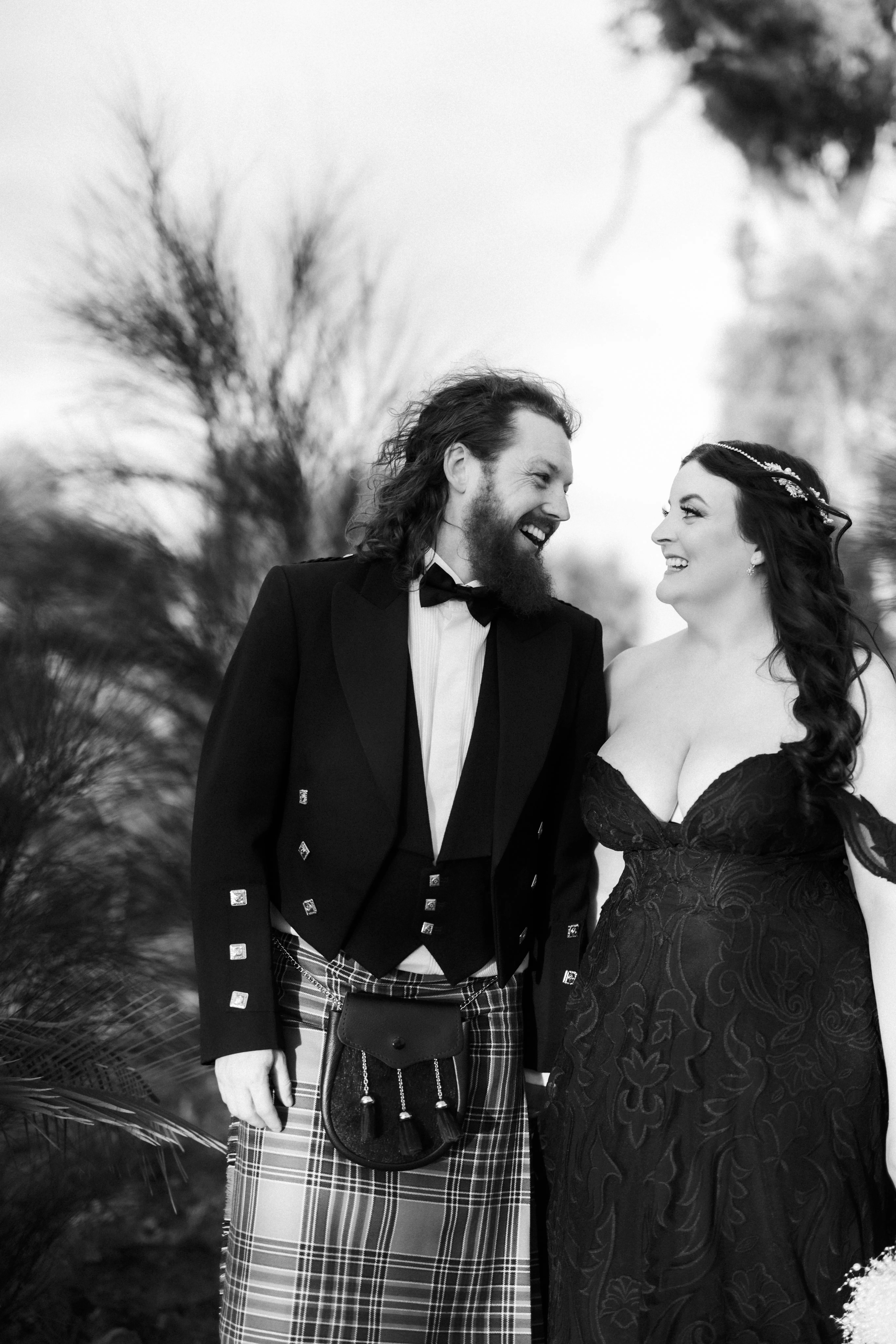 Bride Wearing Black Lace Wedding Dress Called Penny By Maggie Sottero With Groom Dressed In A Kilt