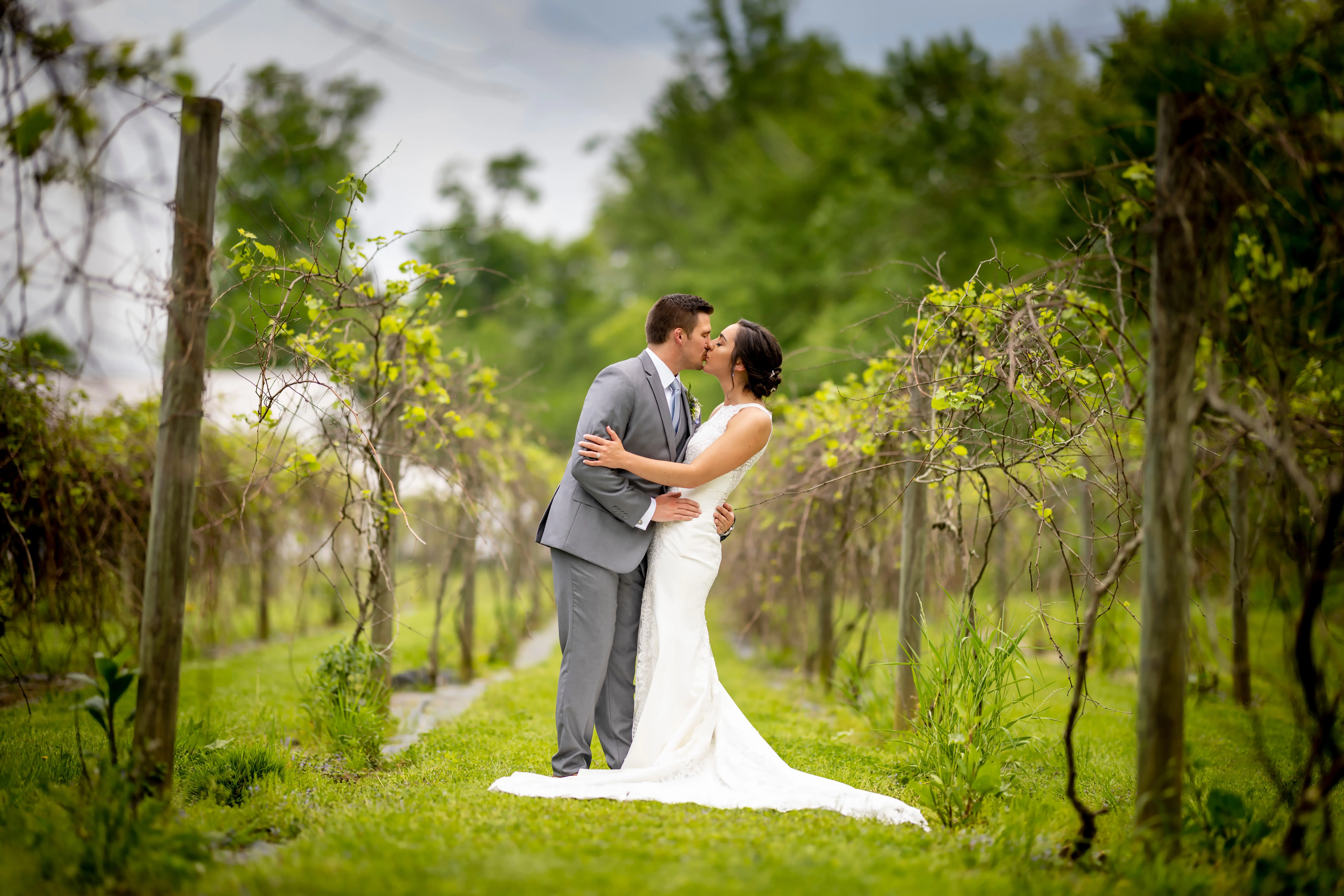 Groom With Bride Wearing Lace Halter Wedding Dress Kevyn By Sottero And Midgley