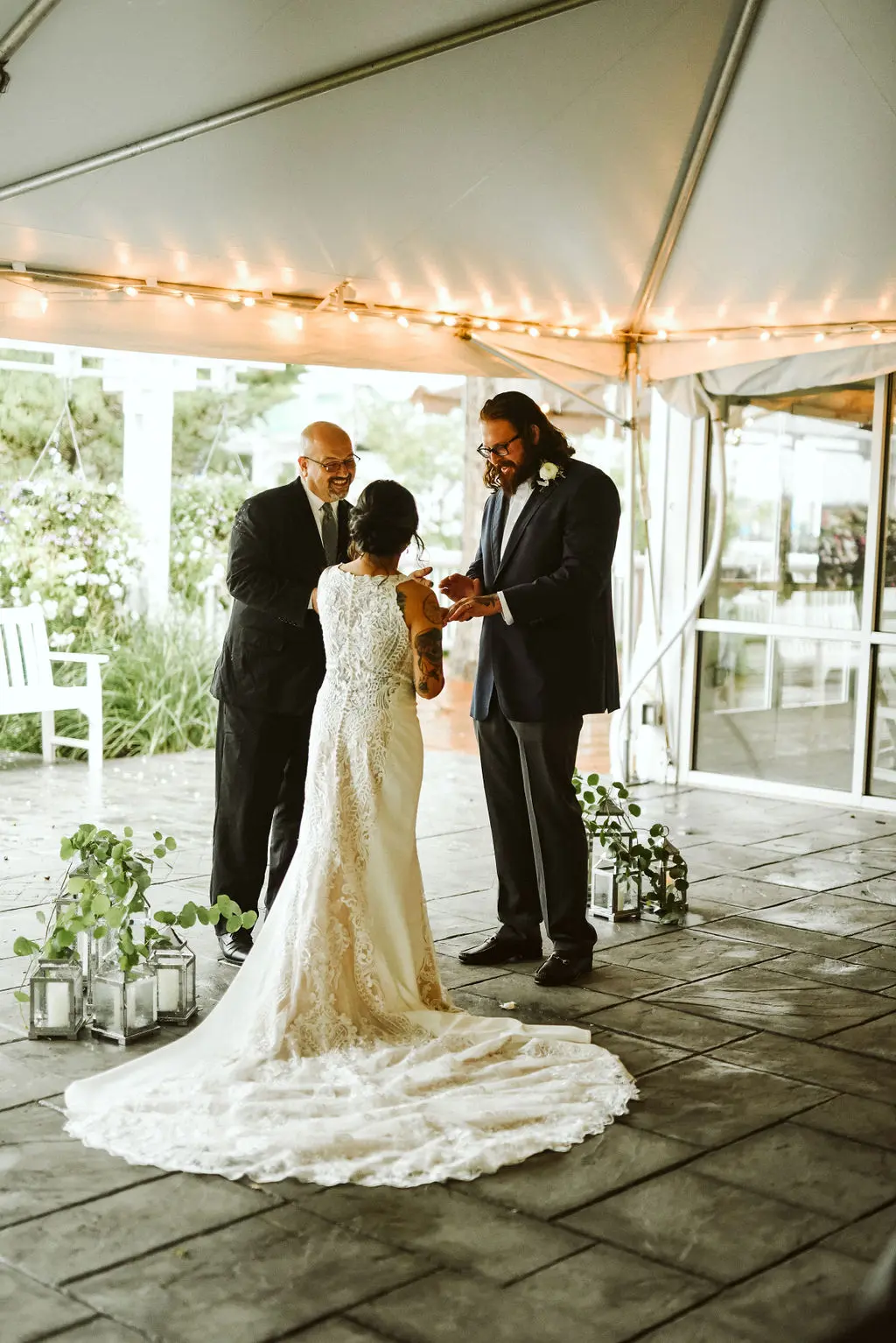 Bride Wearing Halter Lace Wedding Dress Called Kevyn By Sottero And Midgley Exchanging Rings