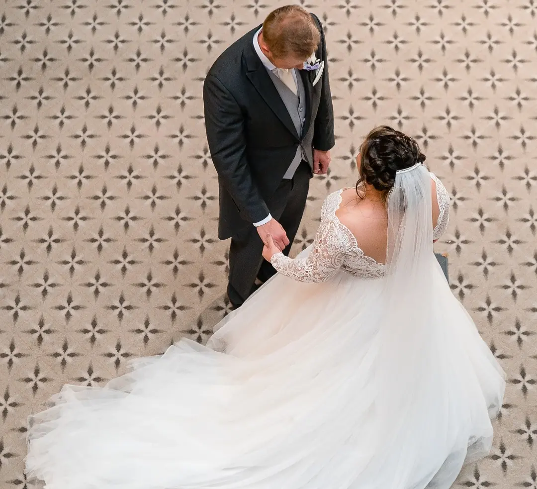 Bride With Groom From Above Looking Down Wearing Wedding Gown Called Mallory Dawn by Maggie Sottero
